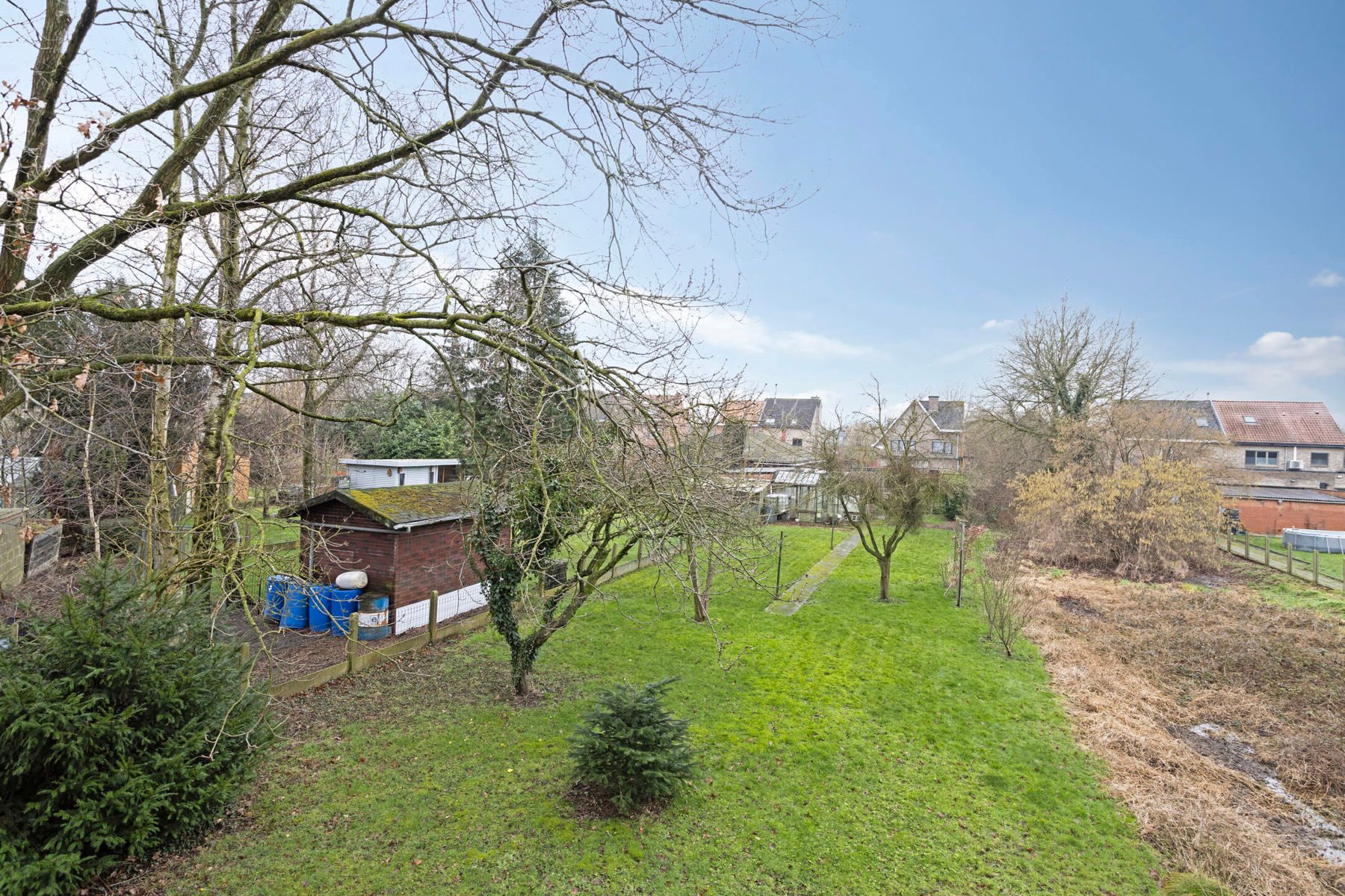 Gezinswoning met 3 slpk, grote tuin, garage en staanplaatsen foto 25