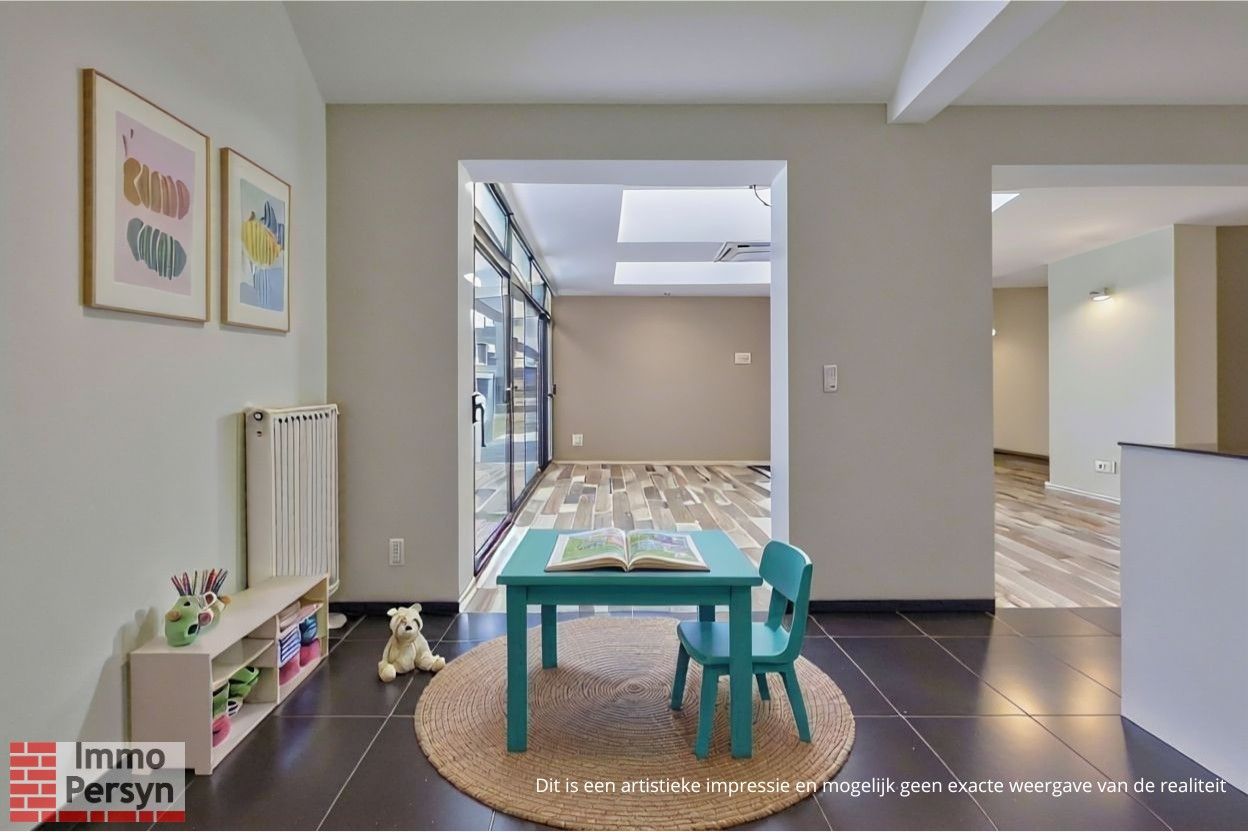 Ruim gelijkvloers appartement met tuin en 2 staanplaatsen. foto 16