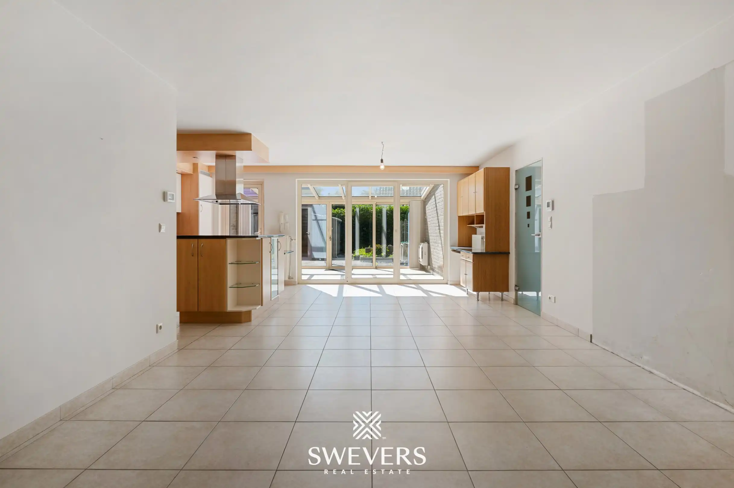 Gelijkvloers appartement met twee slaapkamers, ruime veranda en terras te Bree foto 3