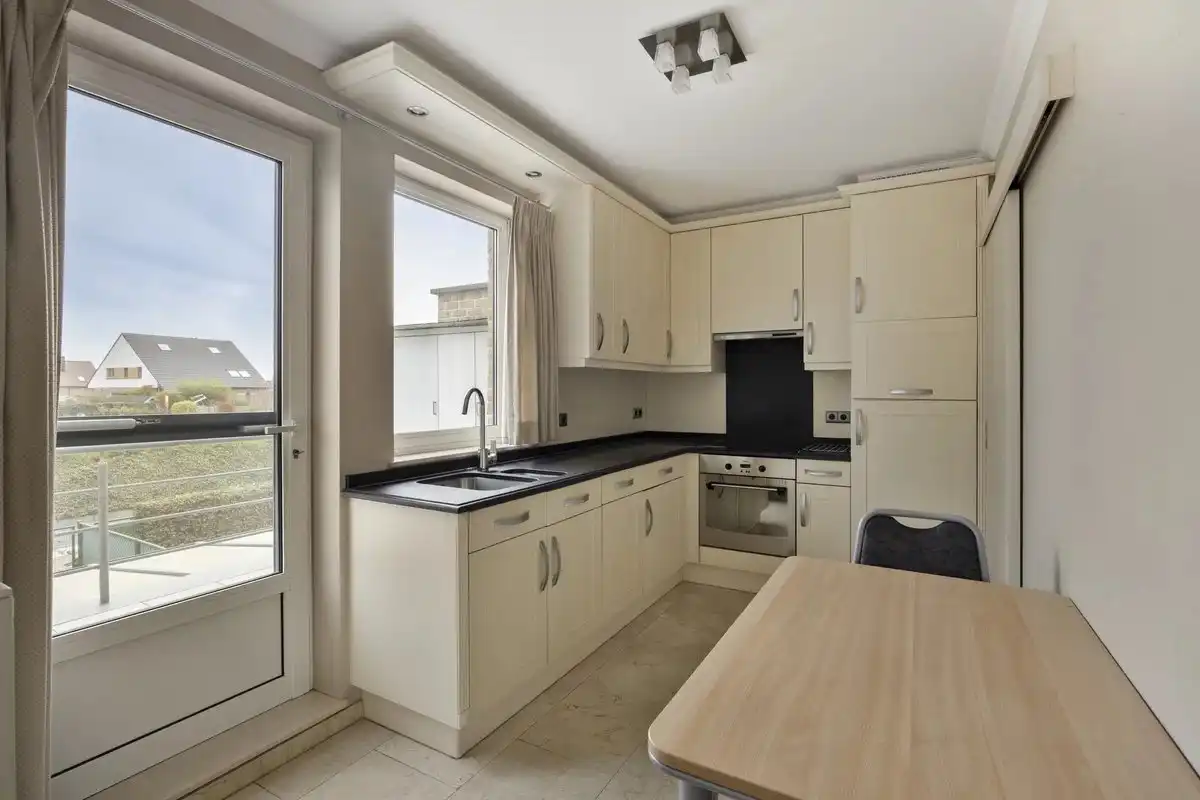 LICHTRIJK APPARTEMENT VAN 92M²  MET TWEE SLPK'S EN UNIEK TERRAS VAN 27M² IN KESSELT foto 7