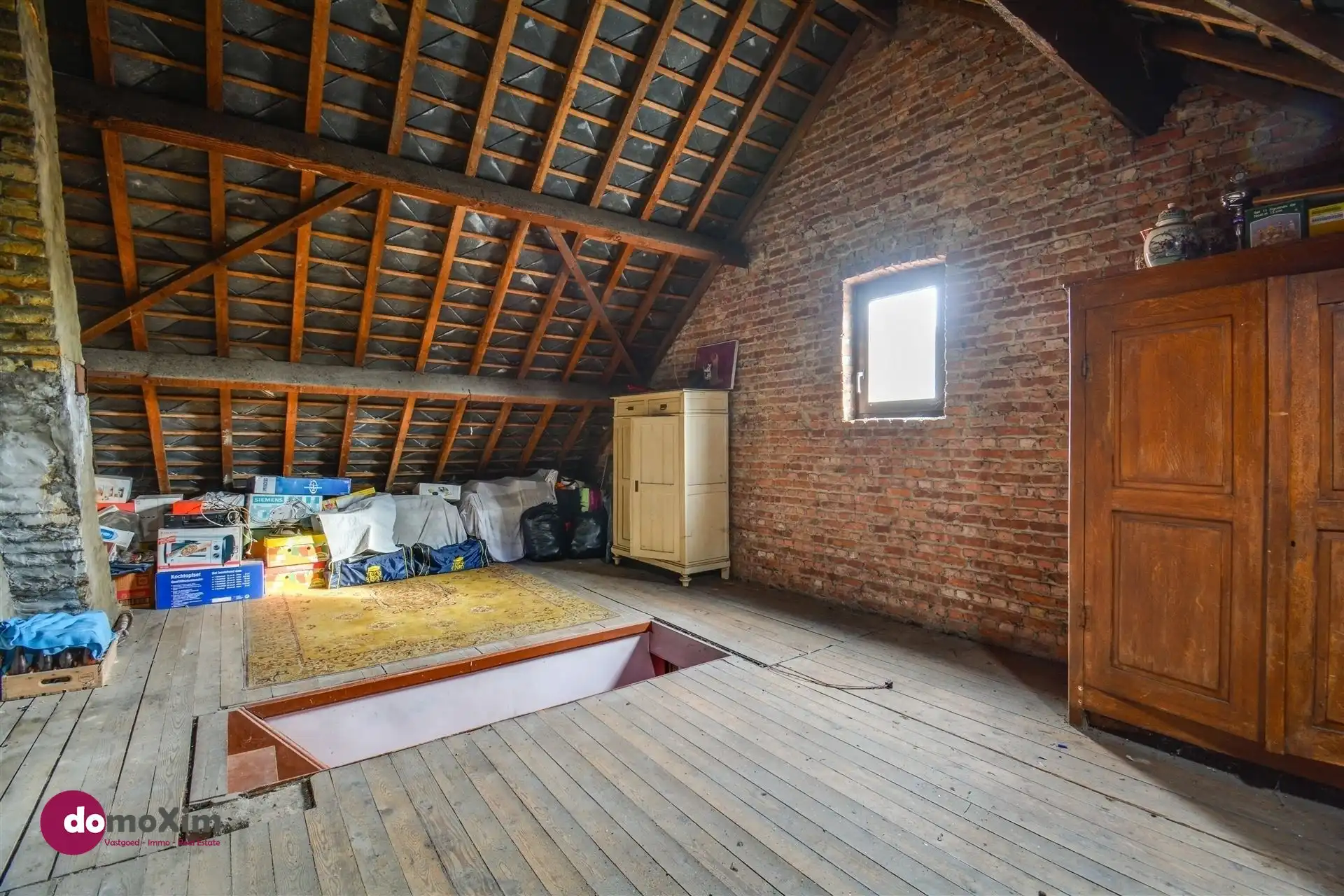 Gezinswoning met 3 slaapkamers en veel potentieel nabij het centrum van Boortmeerbeek foto 14