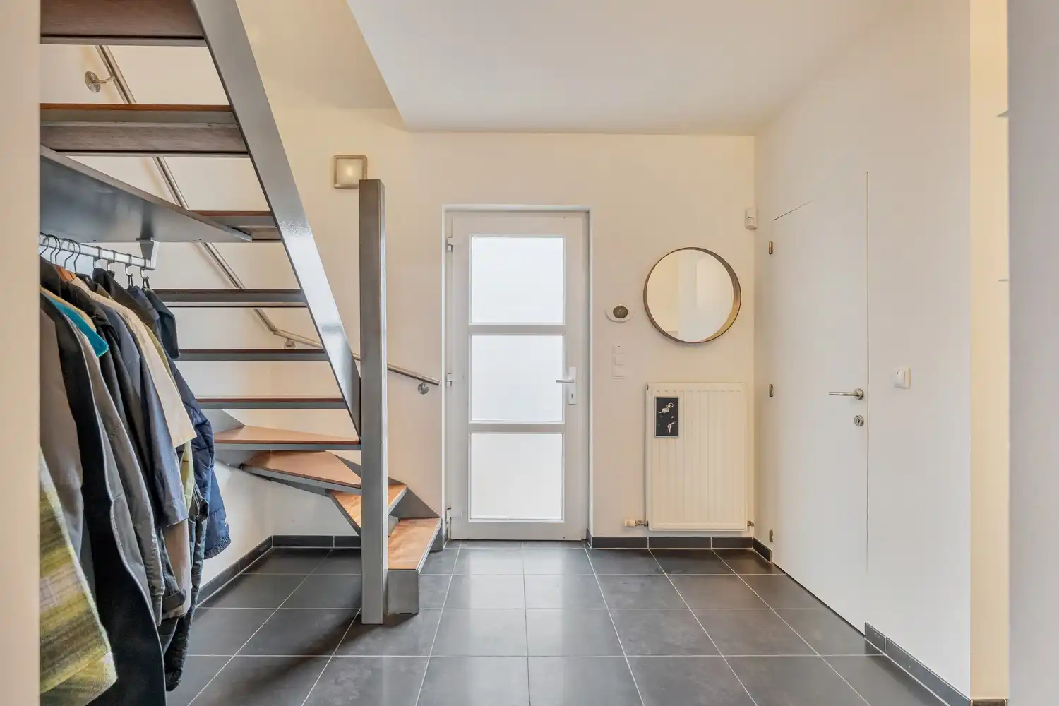 Energiezuinige woning met 4 slaapkamers, een garage en een tuin met een achteruitgang grenzend aan natuurgebied te Bertem! foto 4