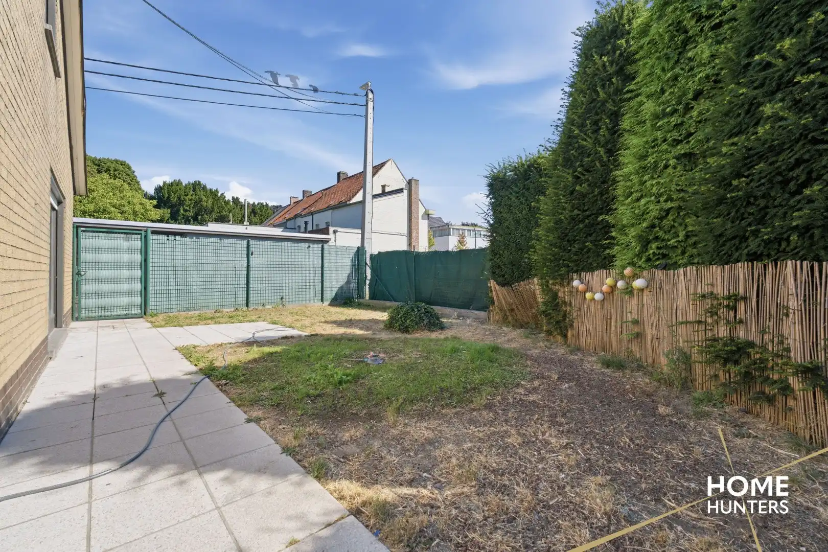 Te renoveren woning met ruime garage en tuin op centrale ligging te Zwevegem foto 4