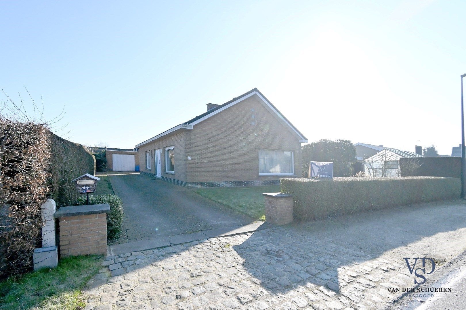 Degelijke bungalowwoning gelegen in een rustige verkaveling foto 25