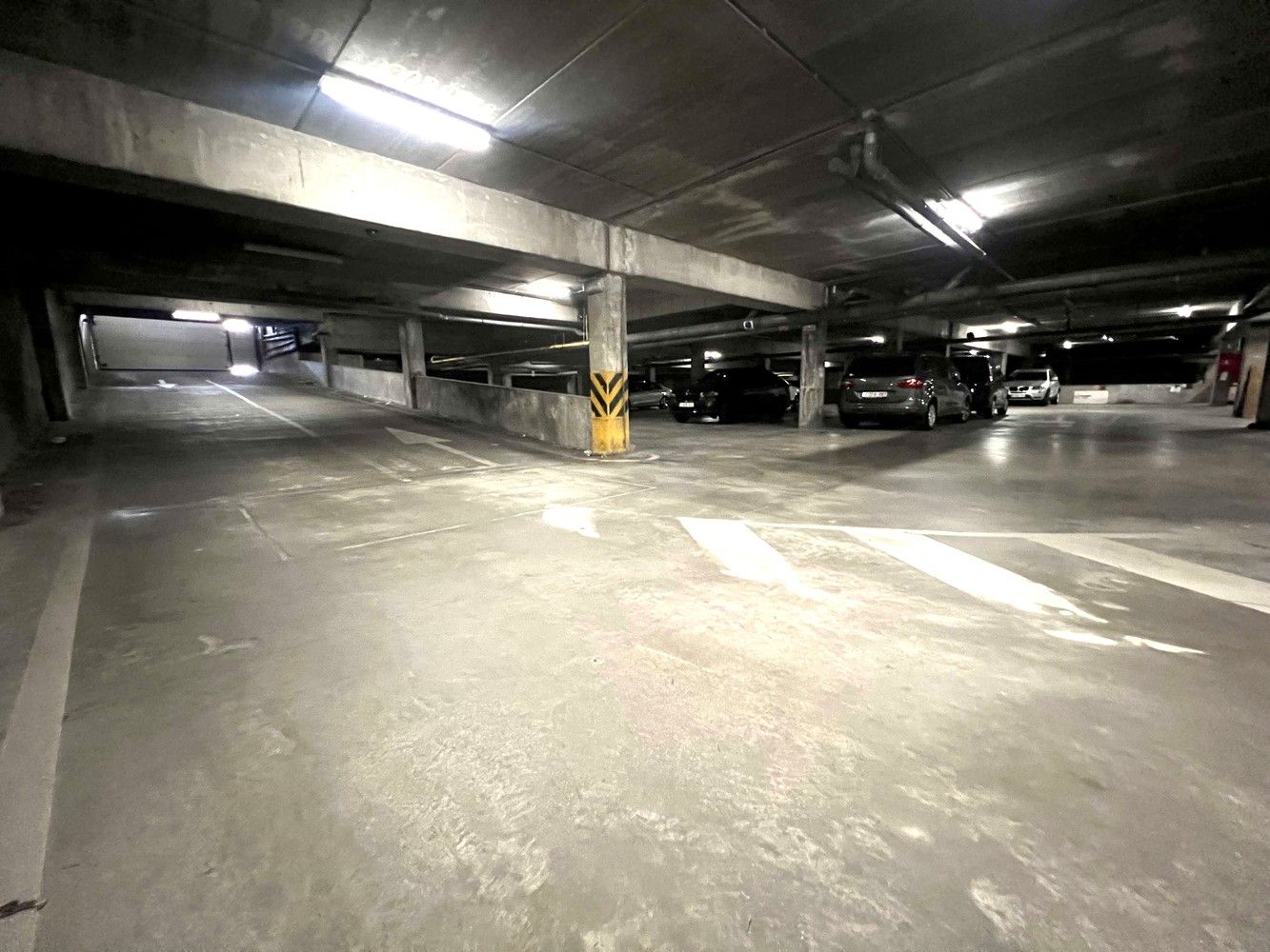 Afgesloten autostaanplaats te koop op toplocatie in de meest centrale parking van Leuven foto 4