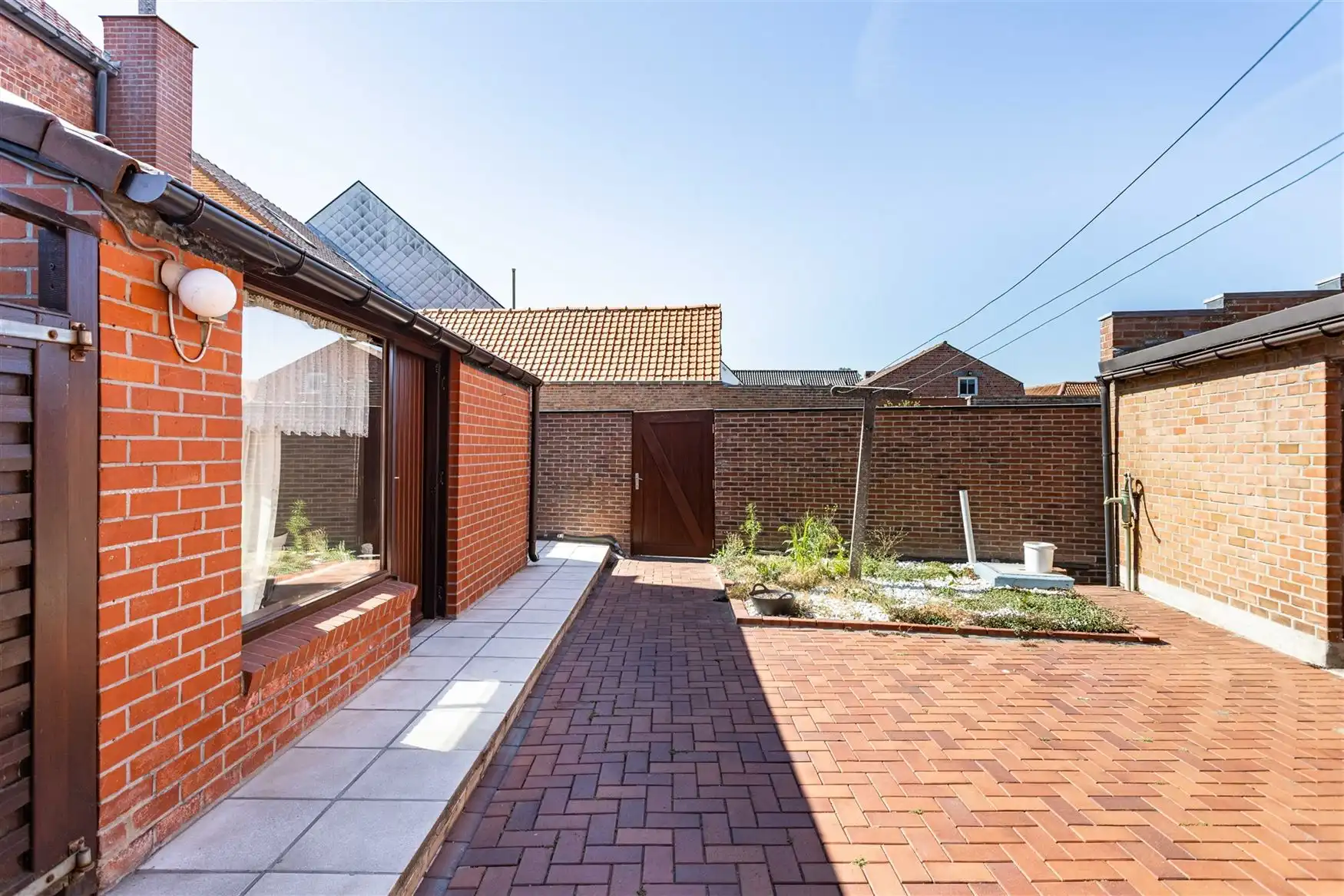 Herwaarderingsproject met twee dorpswoningen foto 12