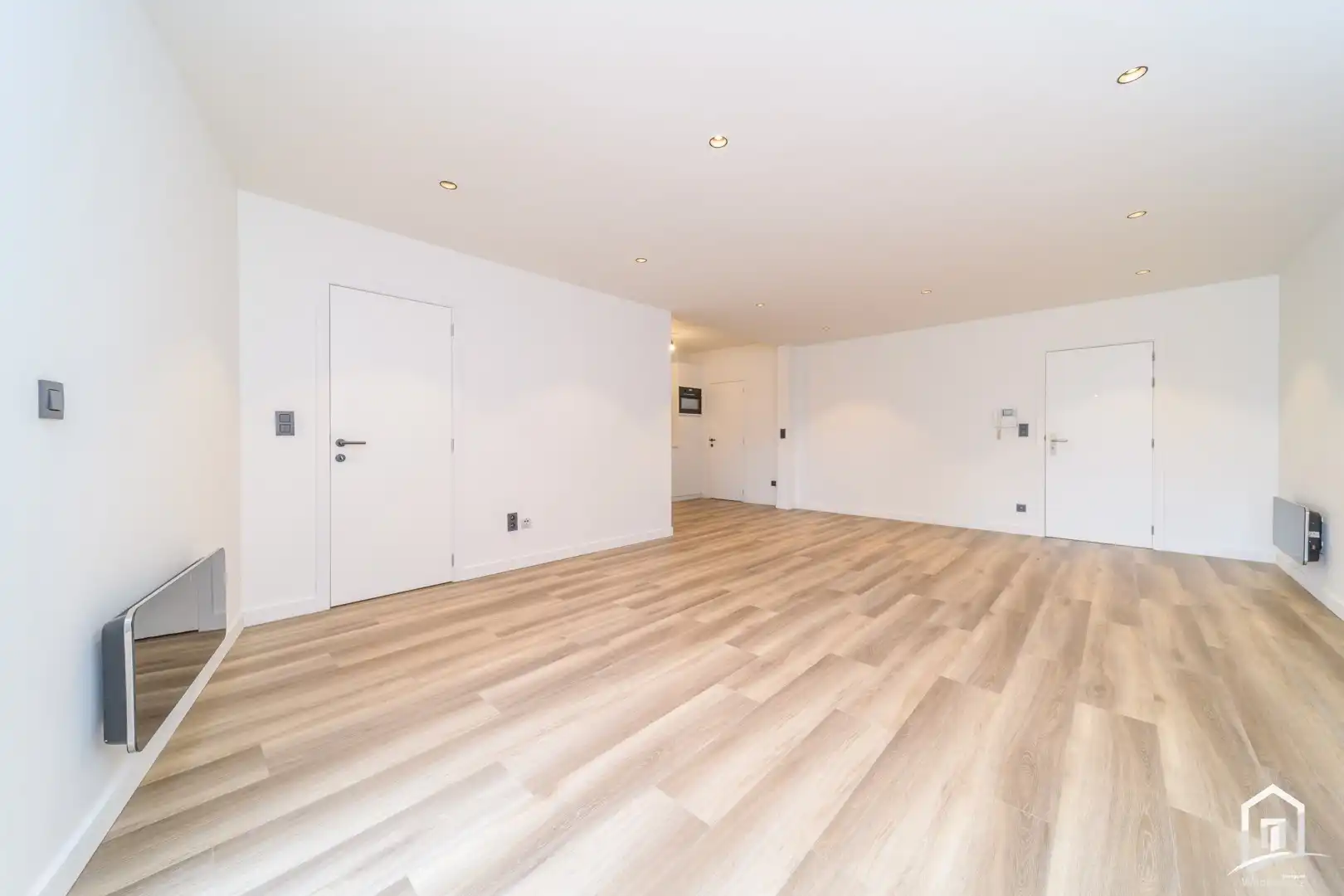 Totaal gerenoveerd gelijkvloers-appartement met tuintje foto 7