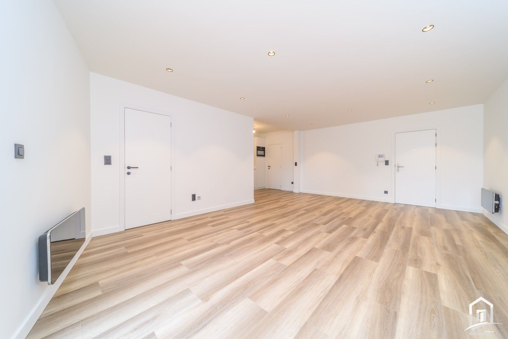 Totaal gerenoveerd gelijkvloers-appartement met tuintje foto 7