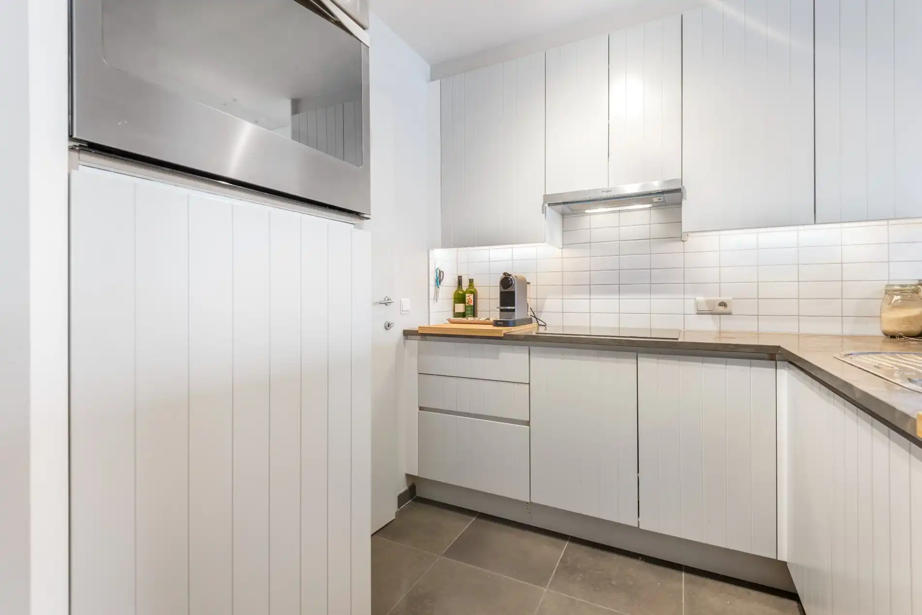 Recent en modern appartement met 2 slpk. gelegen op de belangrijkste winkelstraat van Knokke op wandelafstand van de zeedijk.  foto 9