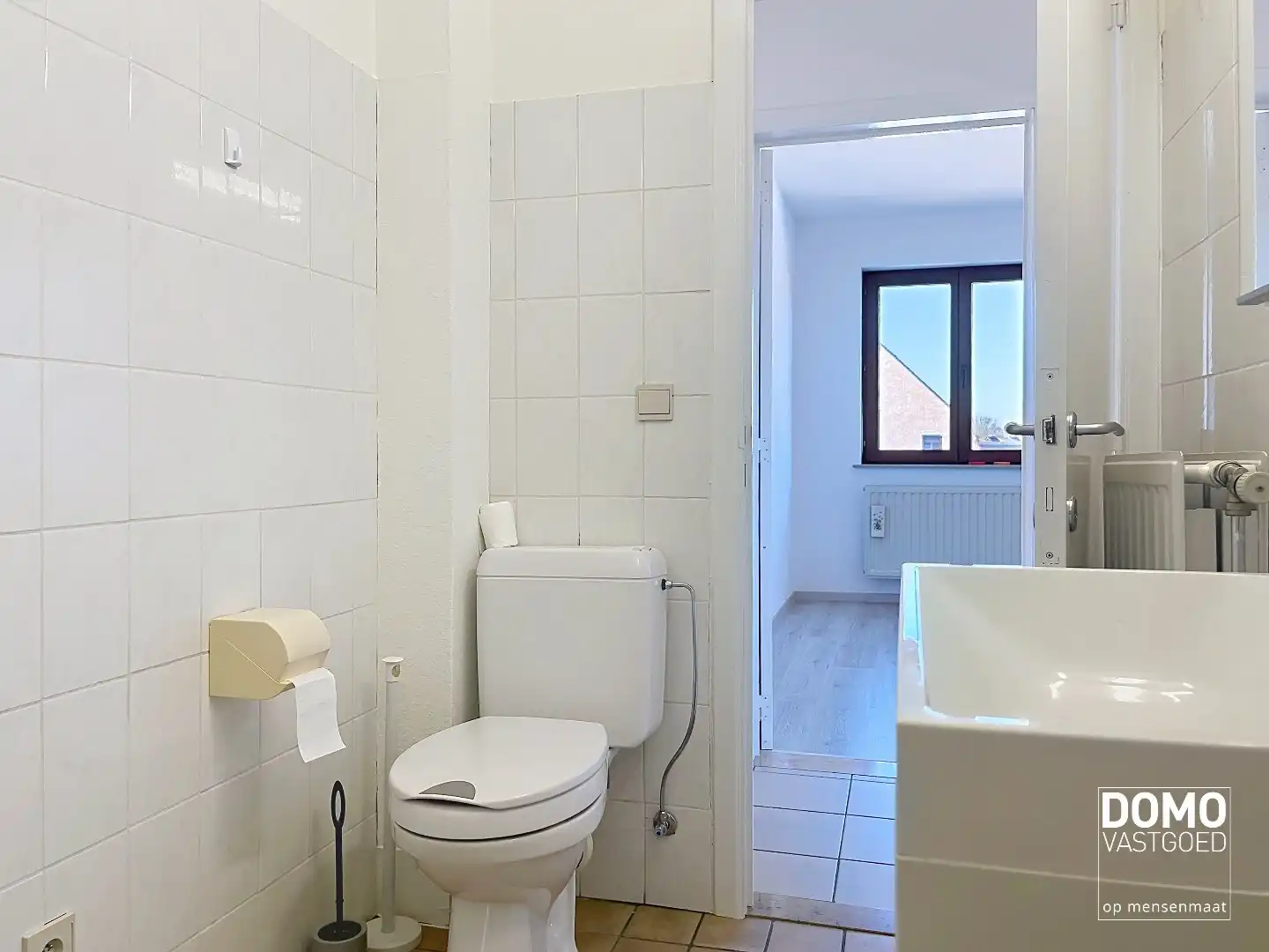 LICHTRIJK APPARTEMENT MET 2 SLAAPKAMERS EN GARAGEBOX foto 12