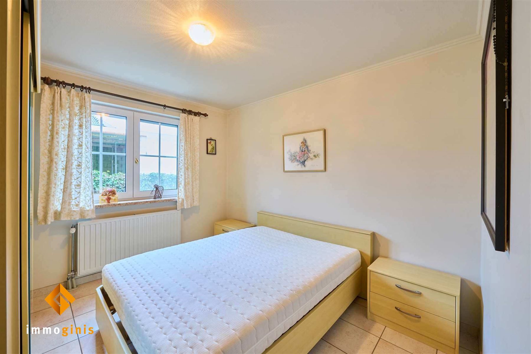 Zeer goed onderhouden woning met 2 slpks (+ mog. tot 2 à 3 extra kamers), overdekt terras en mooie tuin! foto 6