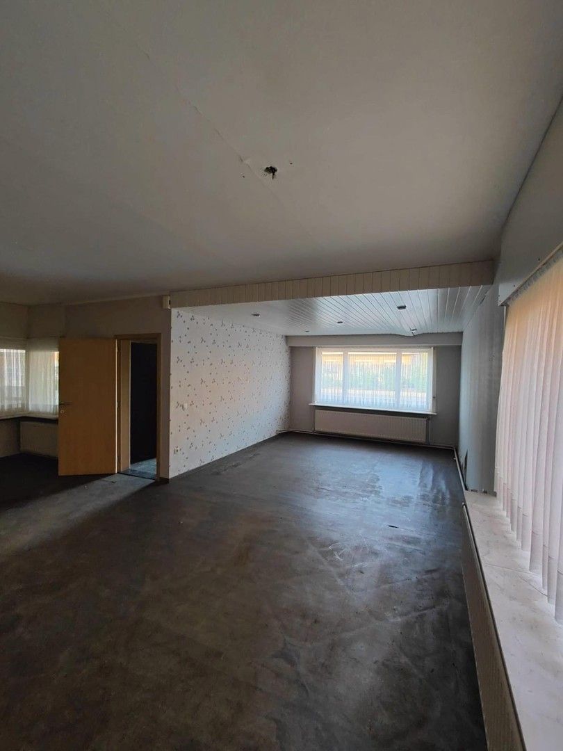 Woning met loods en voormalige showroom foto 22