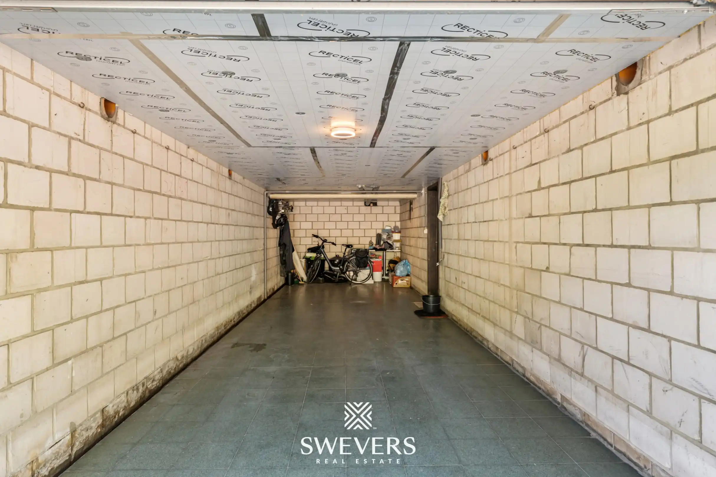 Gerenoveerd appartement met garagebox en kelderberging foto 15