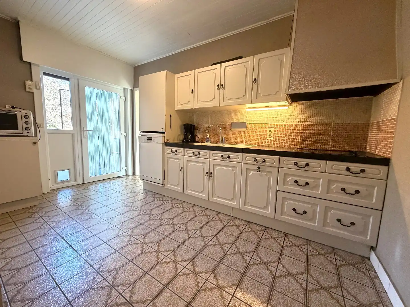 Gelijkvloerse woning met ruime tuin te koop op 720 m² in De Wijnberg te Wevelgem foto 9
