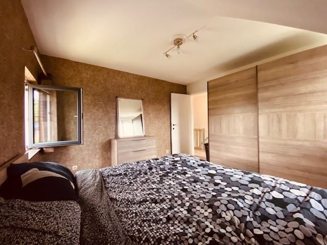 Gezellige halfopen woning met grote tuin foto 4