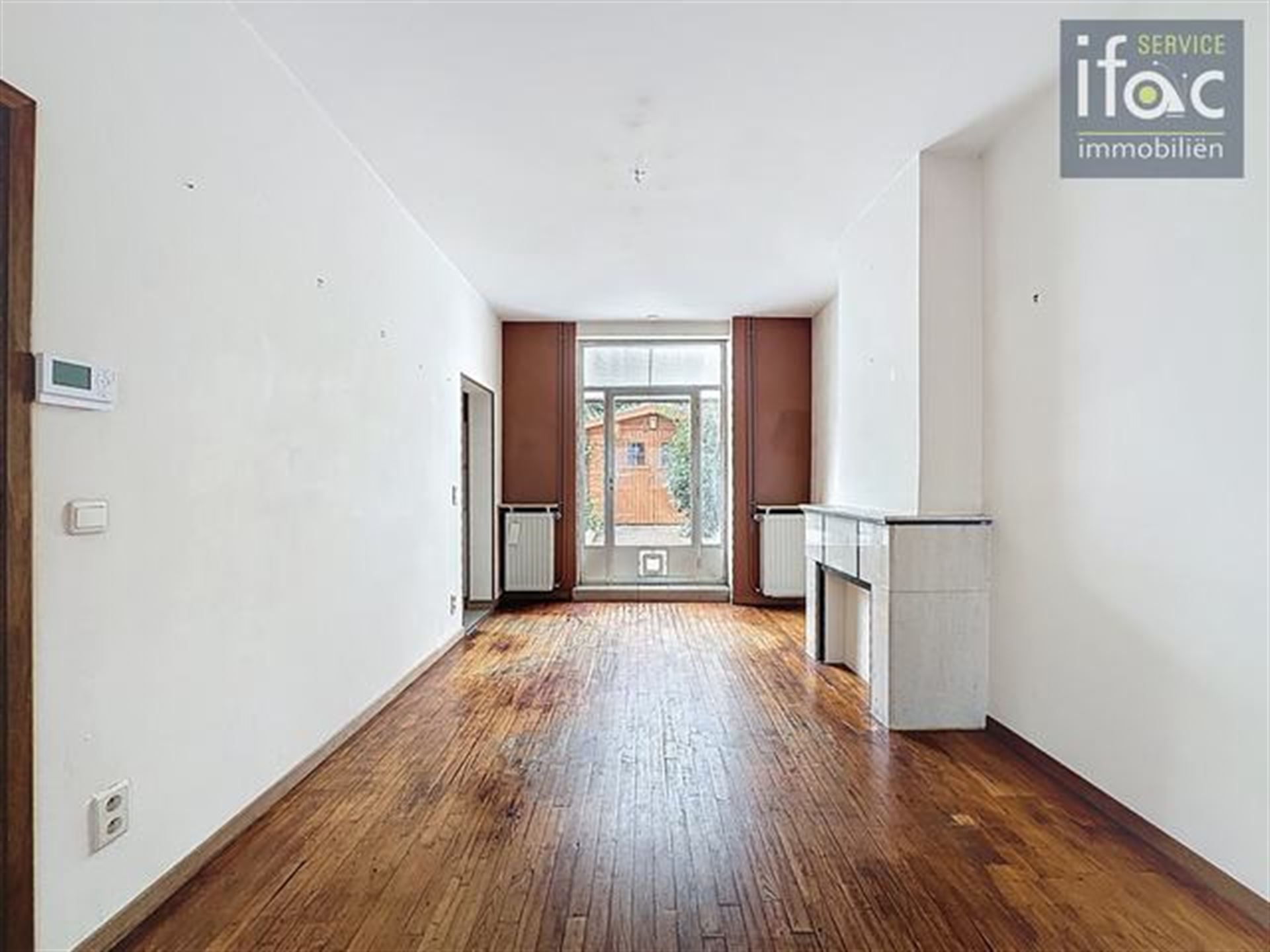 Te renoveren woning in het centrum van Tervuren foto 3