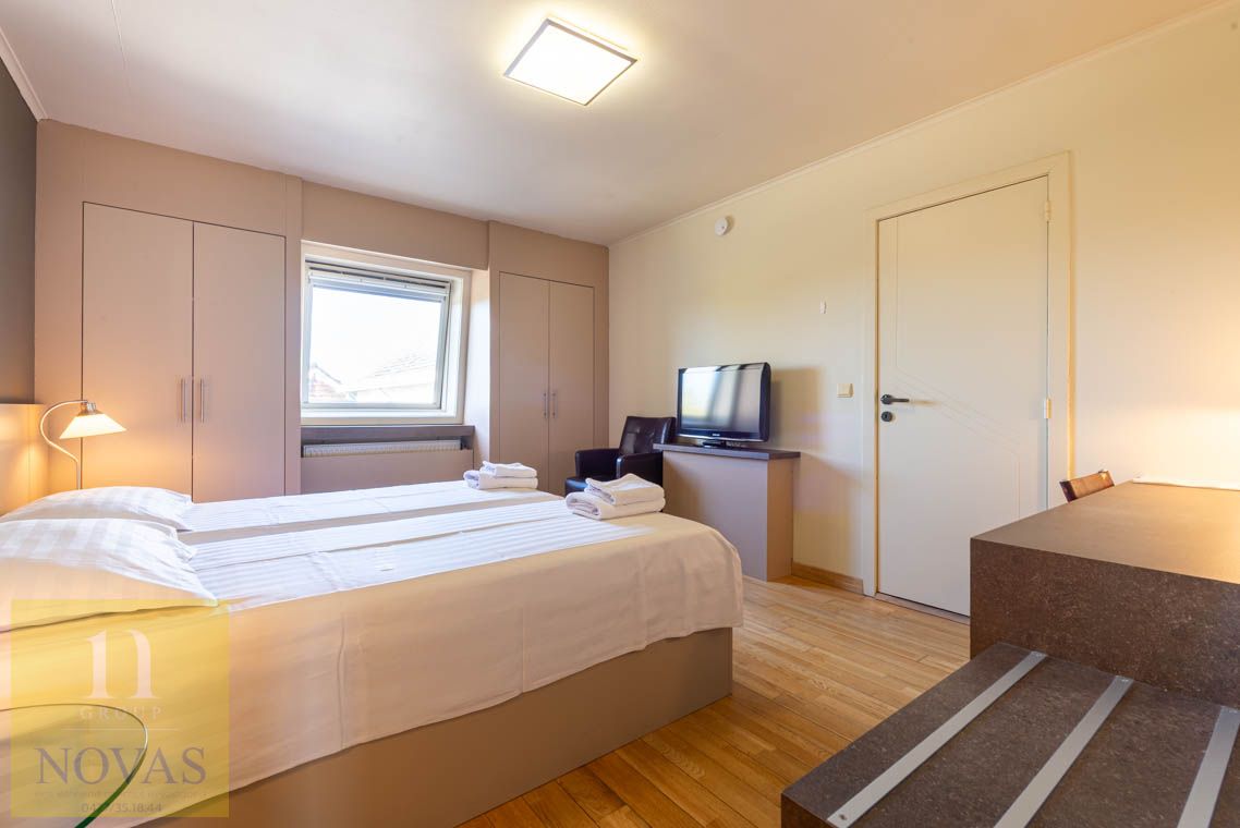 Authentiek handelspand / hotel met restaurant, feestzaal en mooie tuin op ideale locatie. foto 17