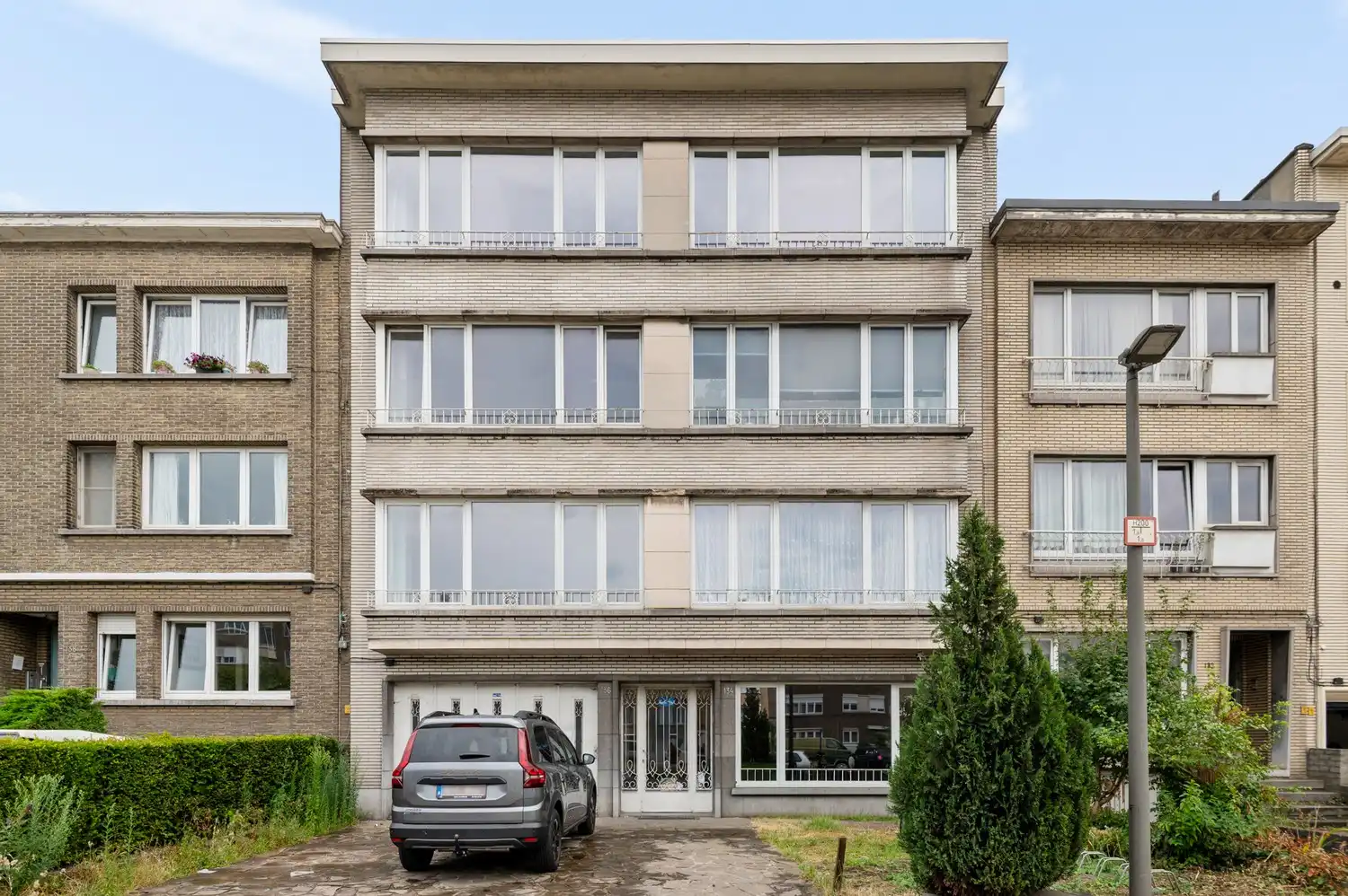 Ruim gelijkvloers appartement met 3 slaapkamers, tuin en garage! foto 18