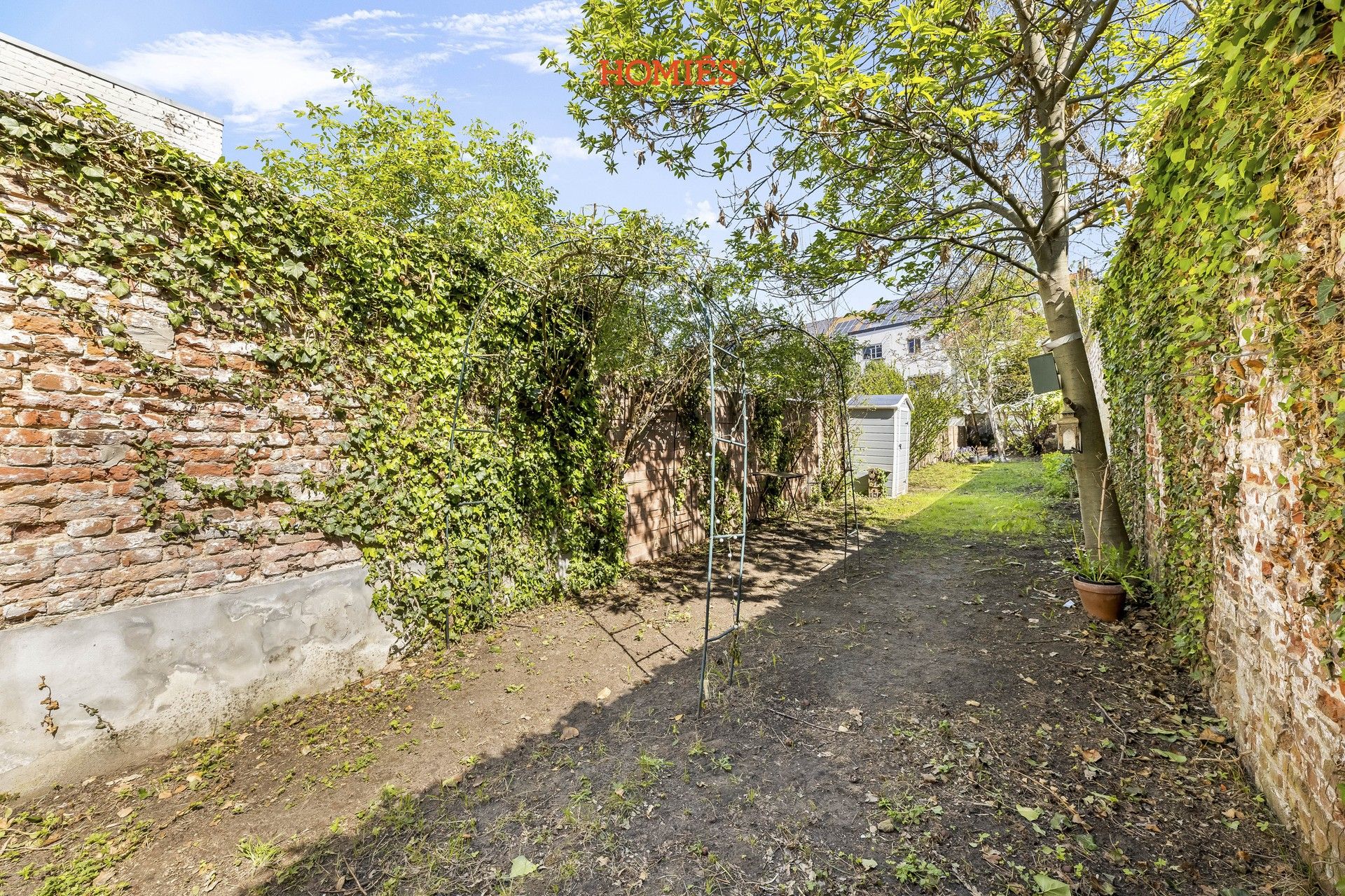 Ruime stadswoning met diepe tuin in centrum Leuven foto 16
