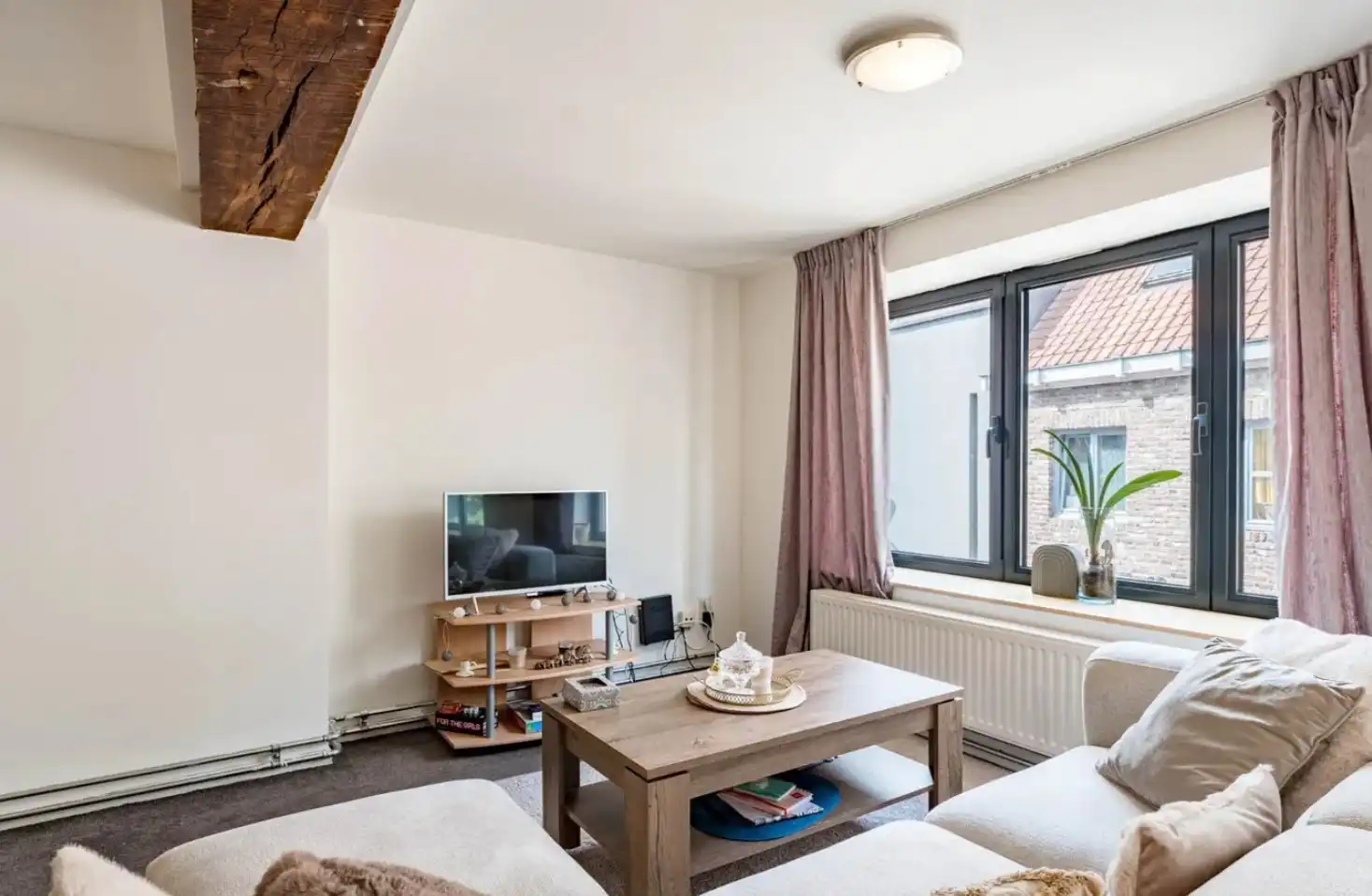 Unieke investeringsopportuniteit in het hart van Maaseik Handelspand + 2 verhuurde appartementen | Centrale ligging | Interessant verhuurpotentieel foto 17
