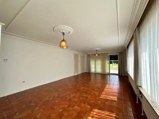 Halfopen woning met 3 slaapkamers, tuin en garage te Neeroeteren.  foto 6