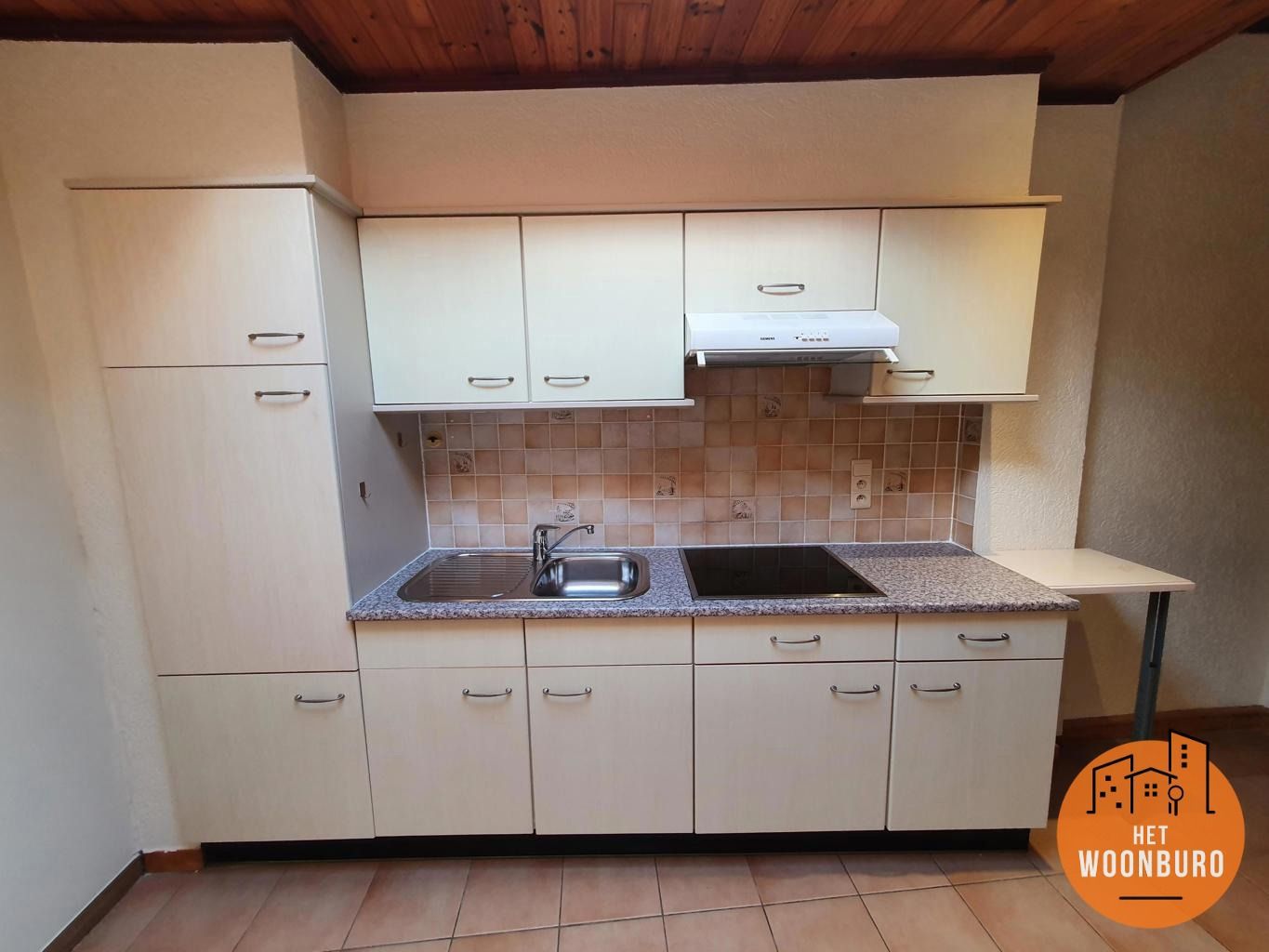 Woning (Gesloten bebouwing) met tuin foto 2