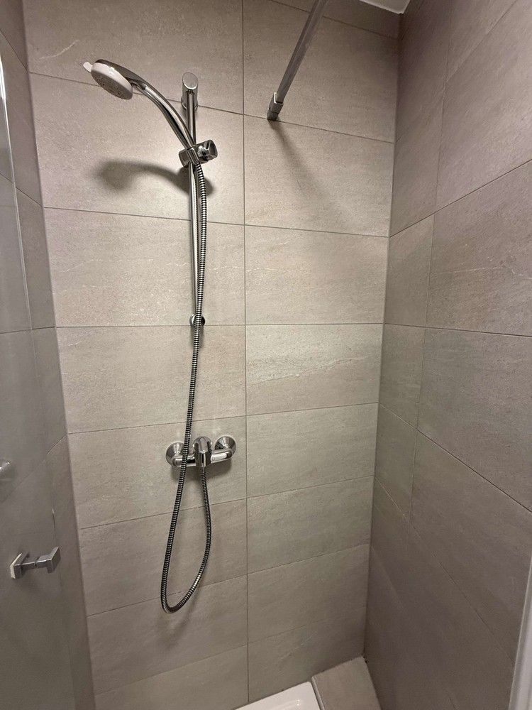 Nieuwbouwappartement met 3 slaapkamers, groot terras en autostaanplaats te huur in centrum Leuven foto 11