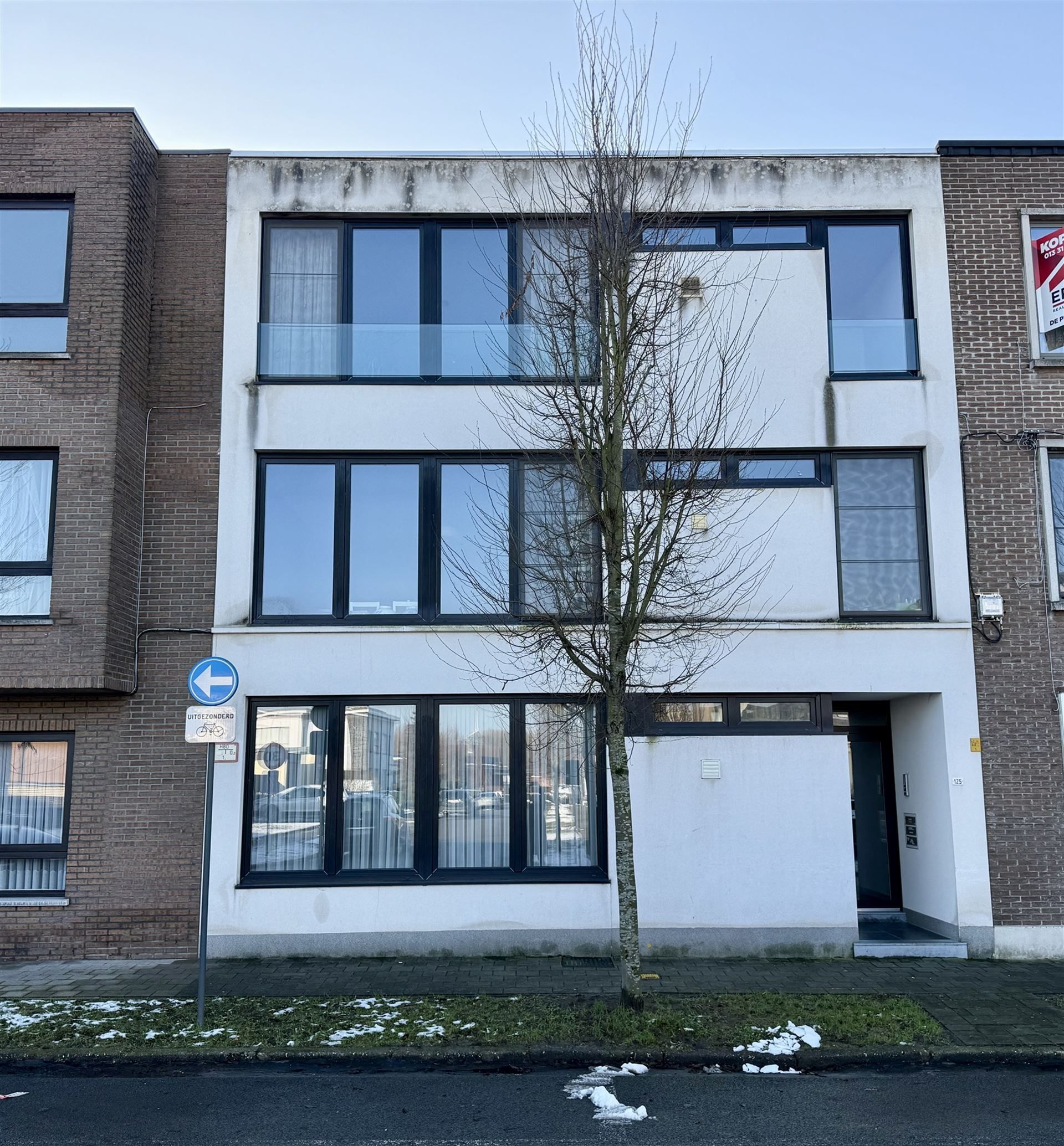 Modern app met 2 slpkmrs en garage in centrum Tessenderlo foto {{pictureIndex}}