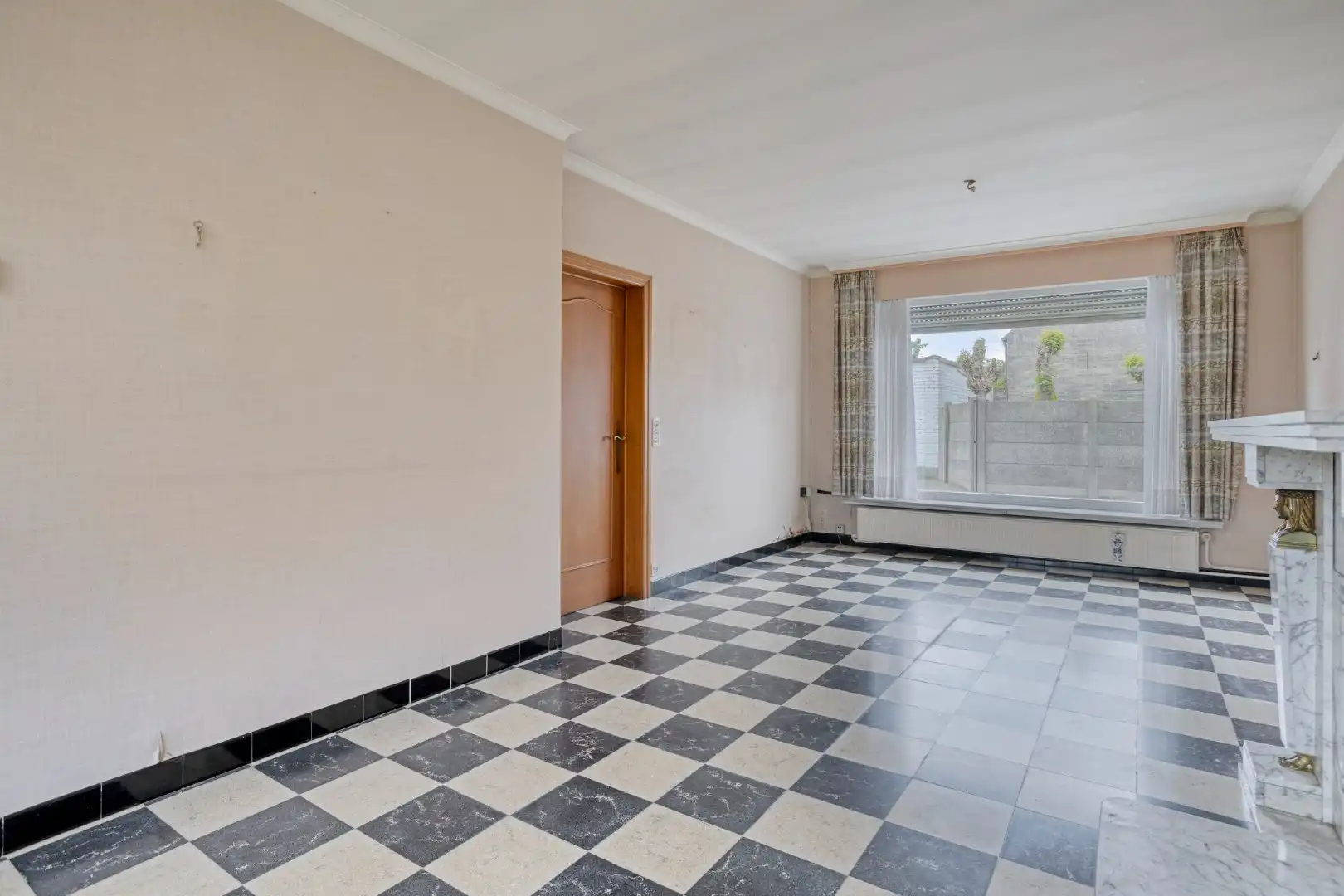 Te renoveren woning met garage en tuin in het centrum van Wevelgem! foto 5