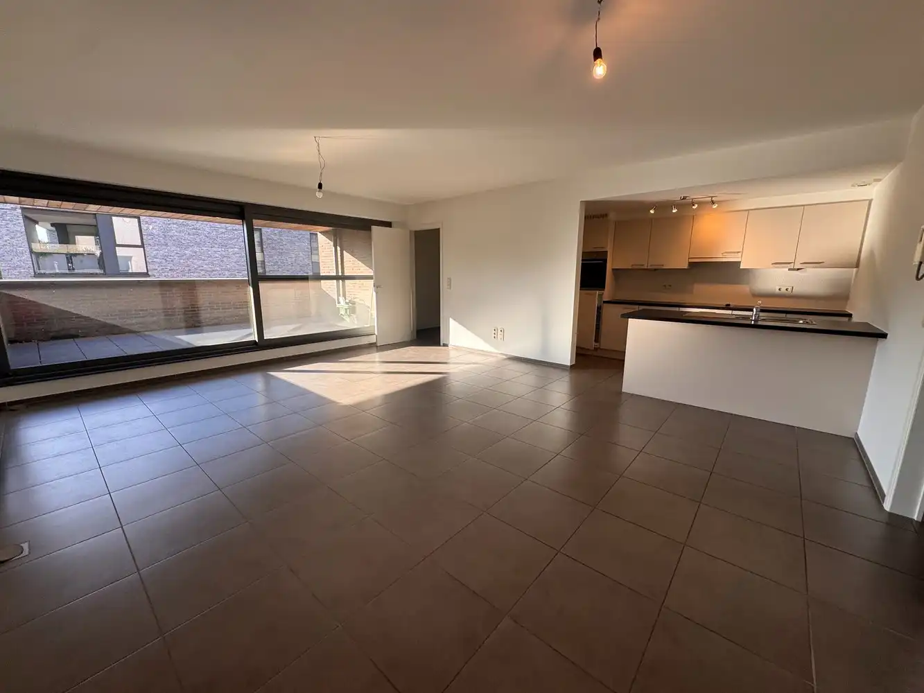 Te huur – Ruim en lichtrijk appartement met 2 slaapkamers in het centrum van Zutendaal foto 4