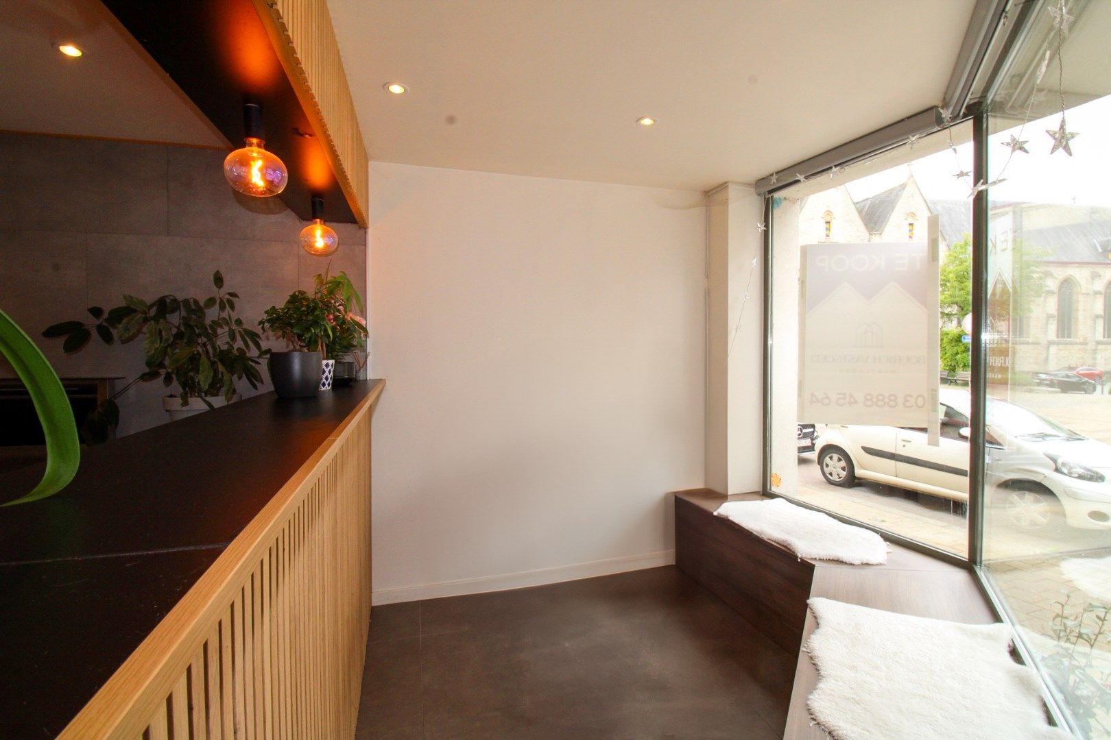 Veelzijdig handelshuis met woonst en luxueuze B&B op toplocatie aan de Markt van Temse! foto 6