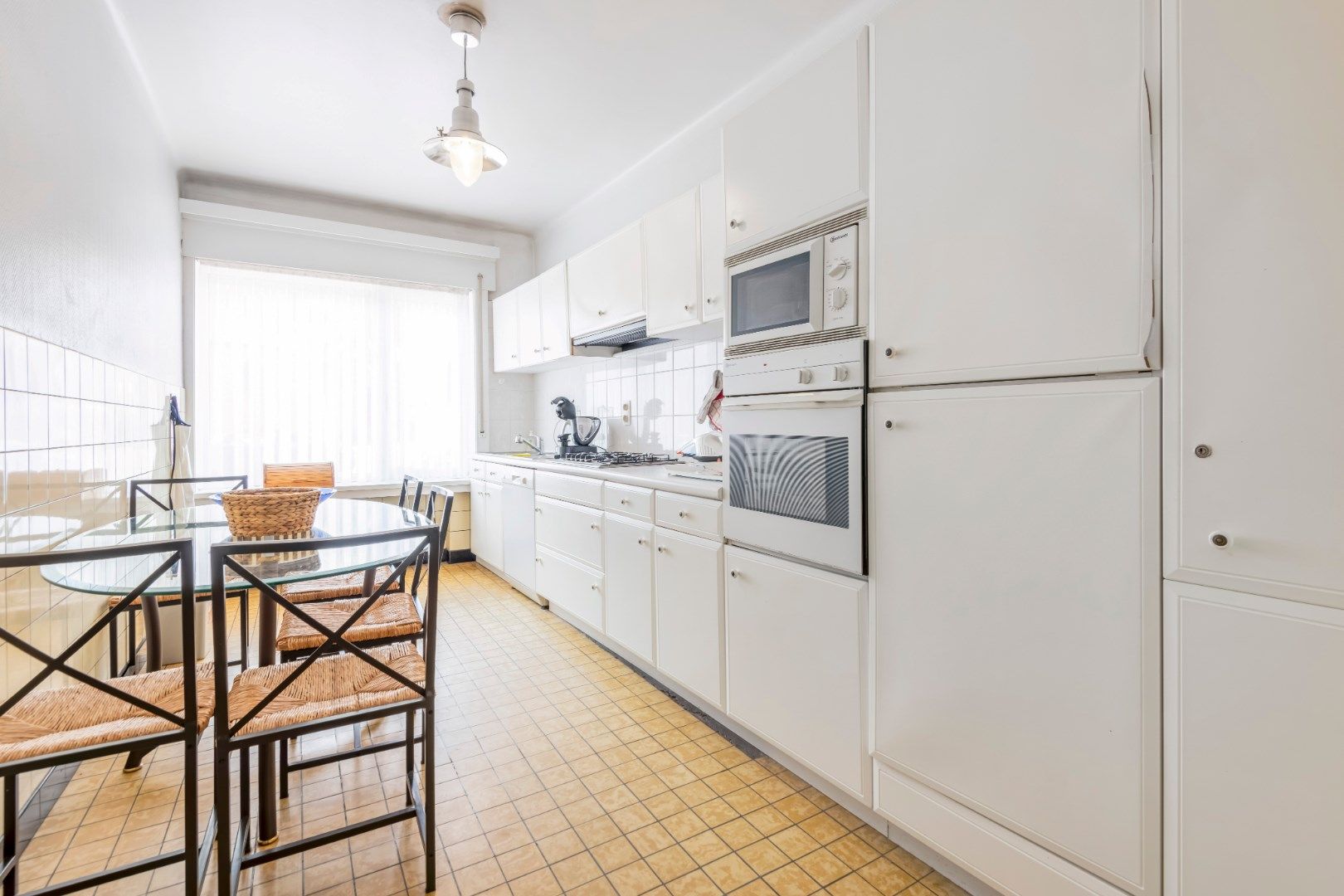 Ruim gelijkvloersappartement met 7,5m gevelbreedte en met binnenkoer 50m² gelegen vlakbij de Dumortierlaan foto 7