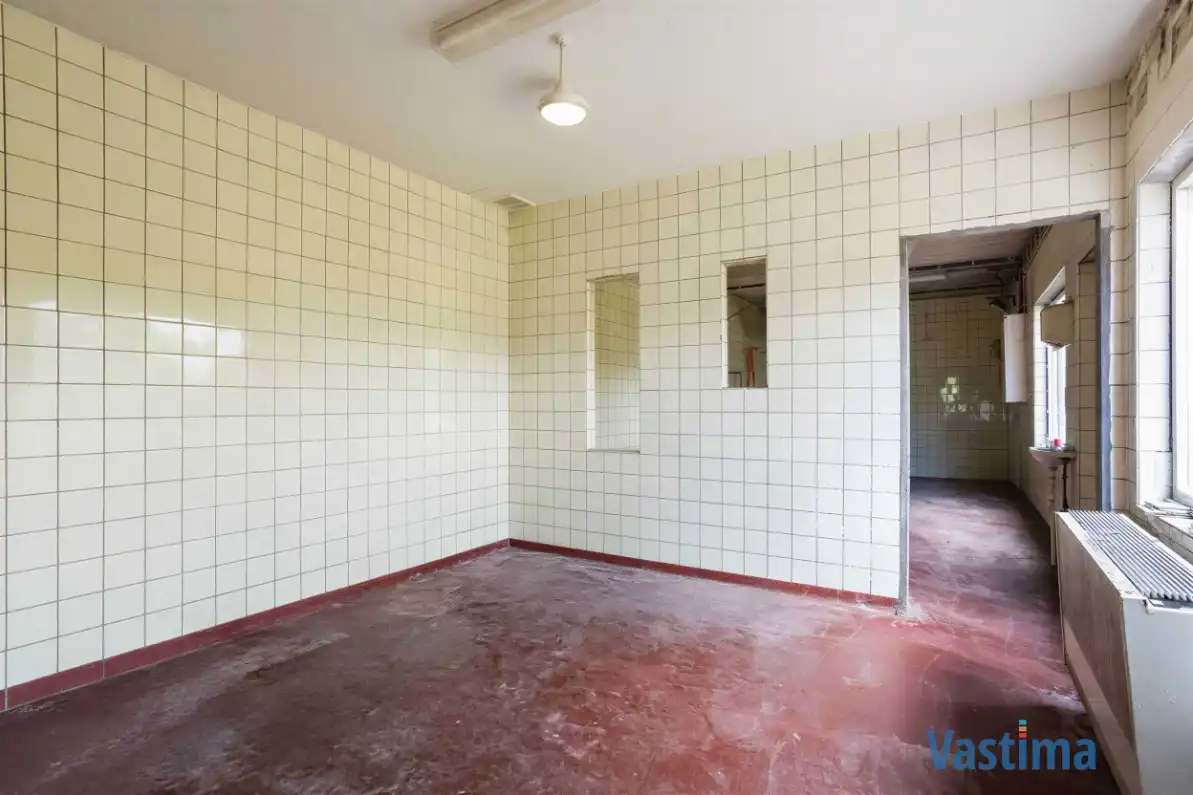 Woning met opslagruimte en grond op strategische ligging foto 23
