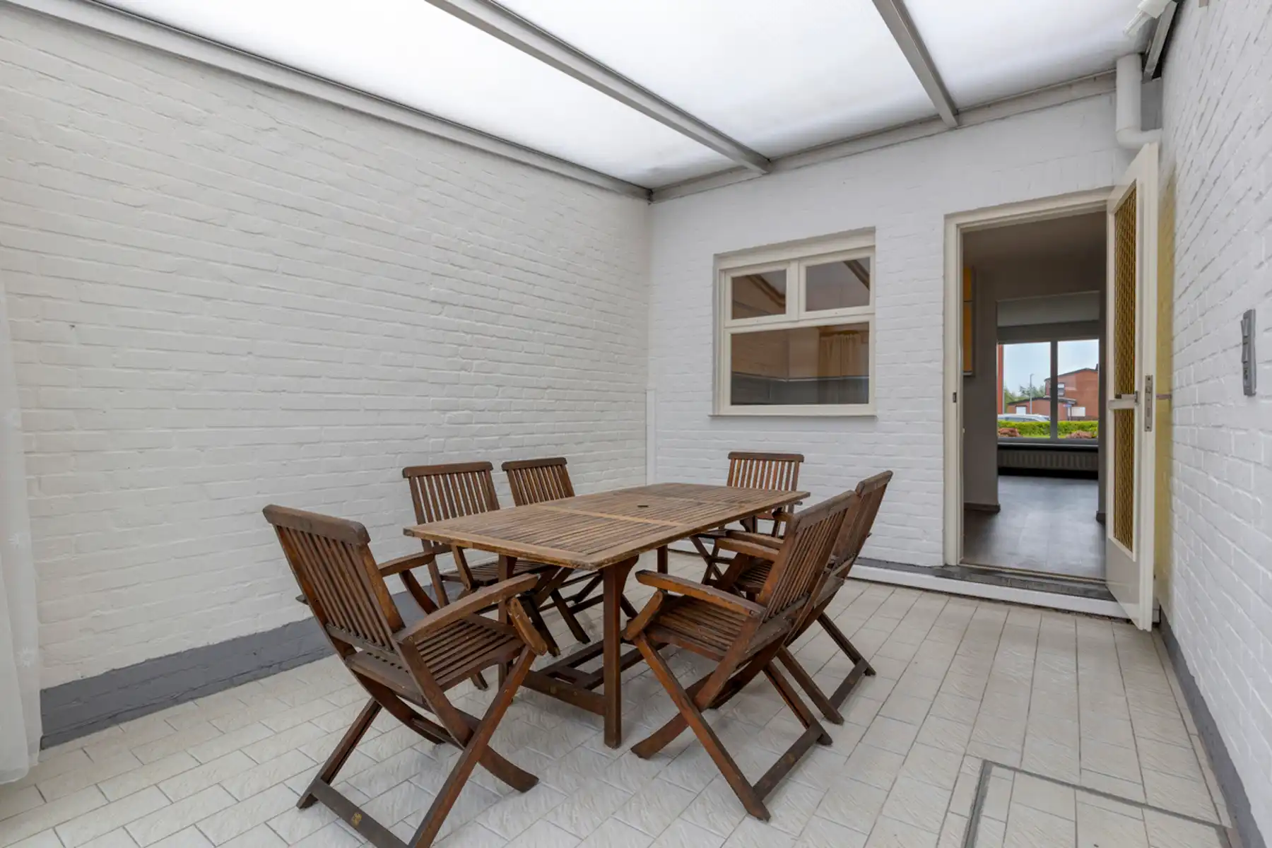 Instapklare centrum-woning pal bij centrum Buggenhout  foto 24