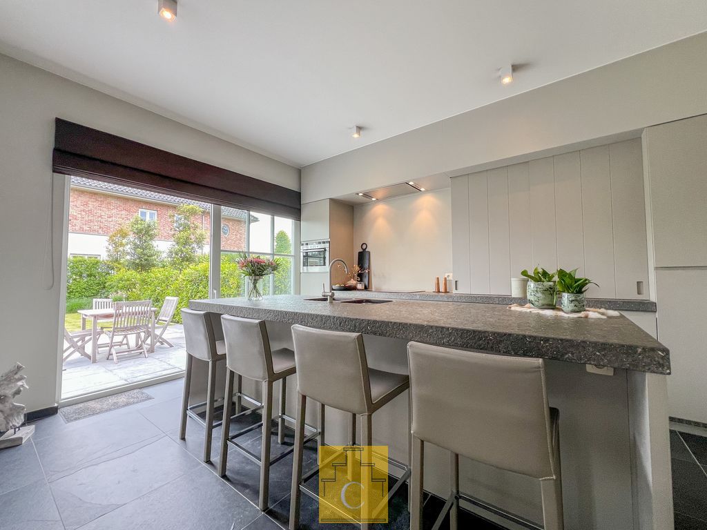 instapklare half open woning met garage en zonnige tuin foto 5