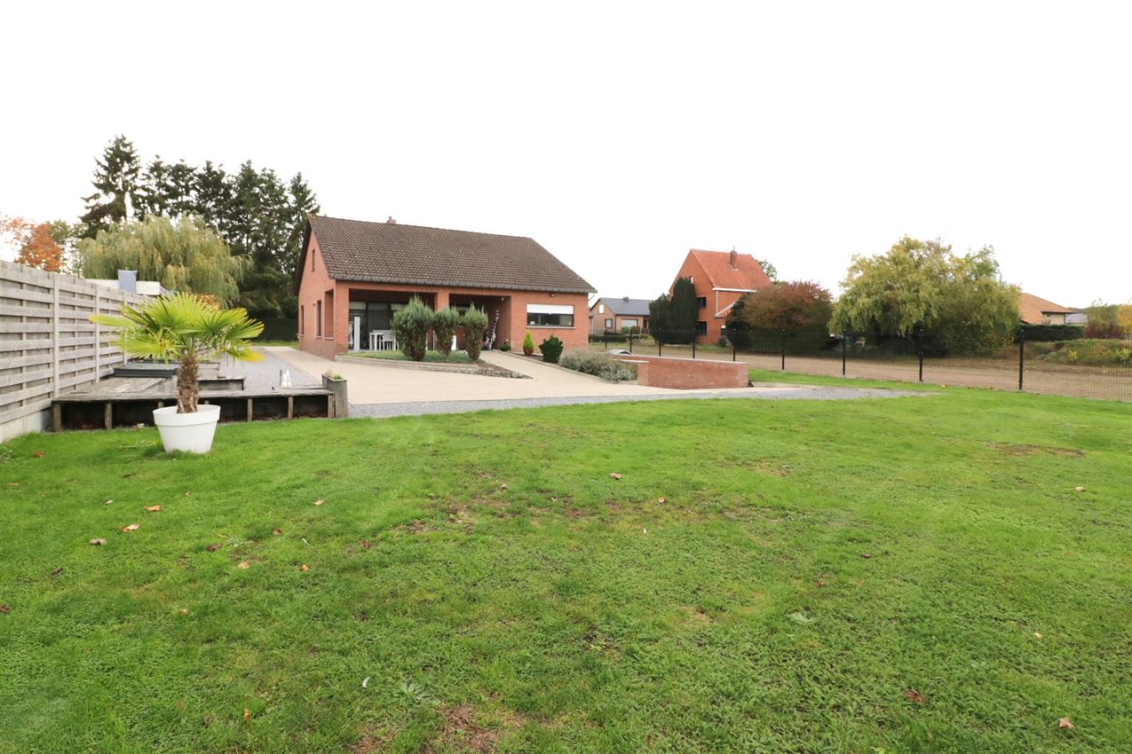 Gezellige woning, 4 slpk., inpandige garage, tuin foto 2