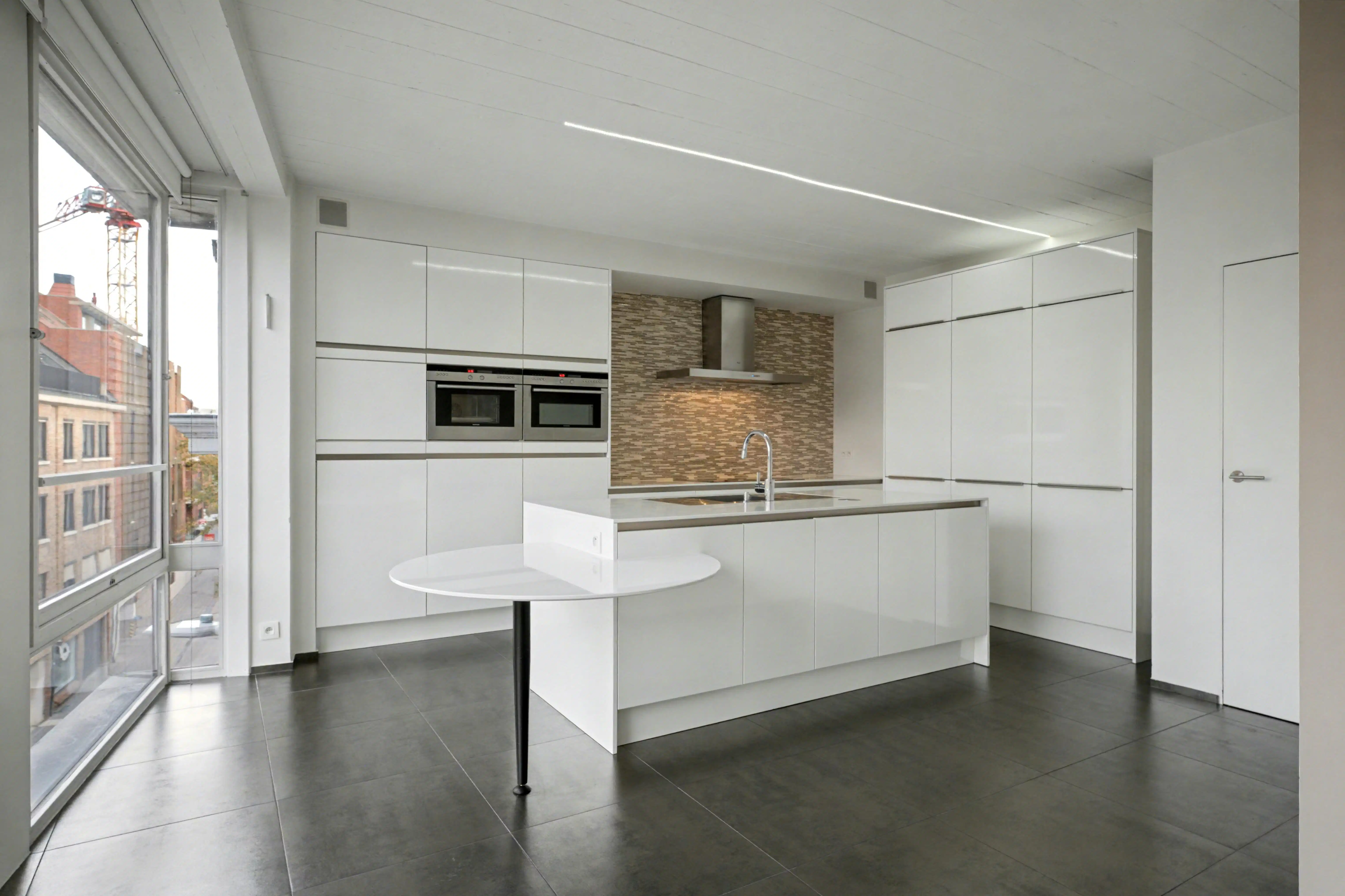 Exclusief duplex-penthouse met adembenemend terras in hartje Hasselt foto 4