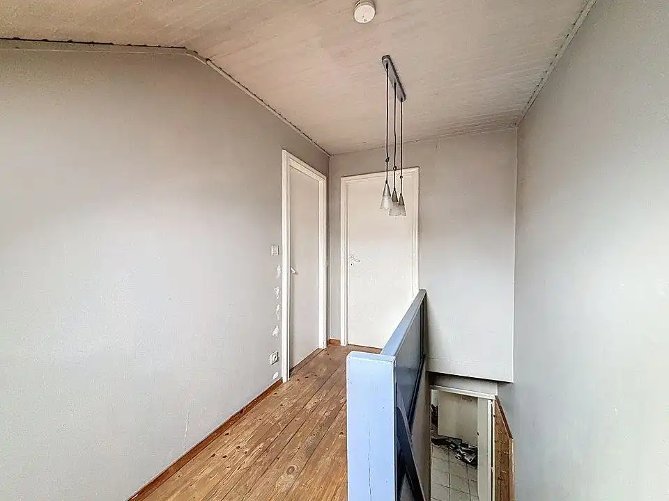 Te renoveren huis te koop in centrum Wuustwezel foto 11