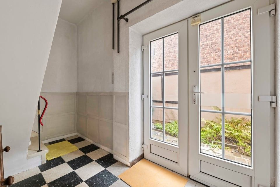 HALFOPEN BEBOUWING MET GARAGE EN GROTE TUIN IN TONGEREN foto 10