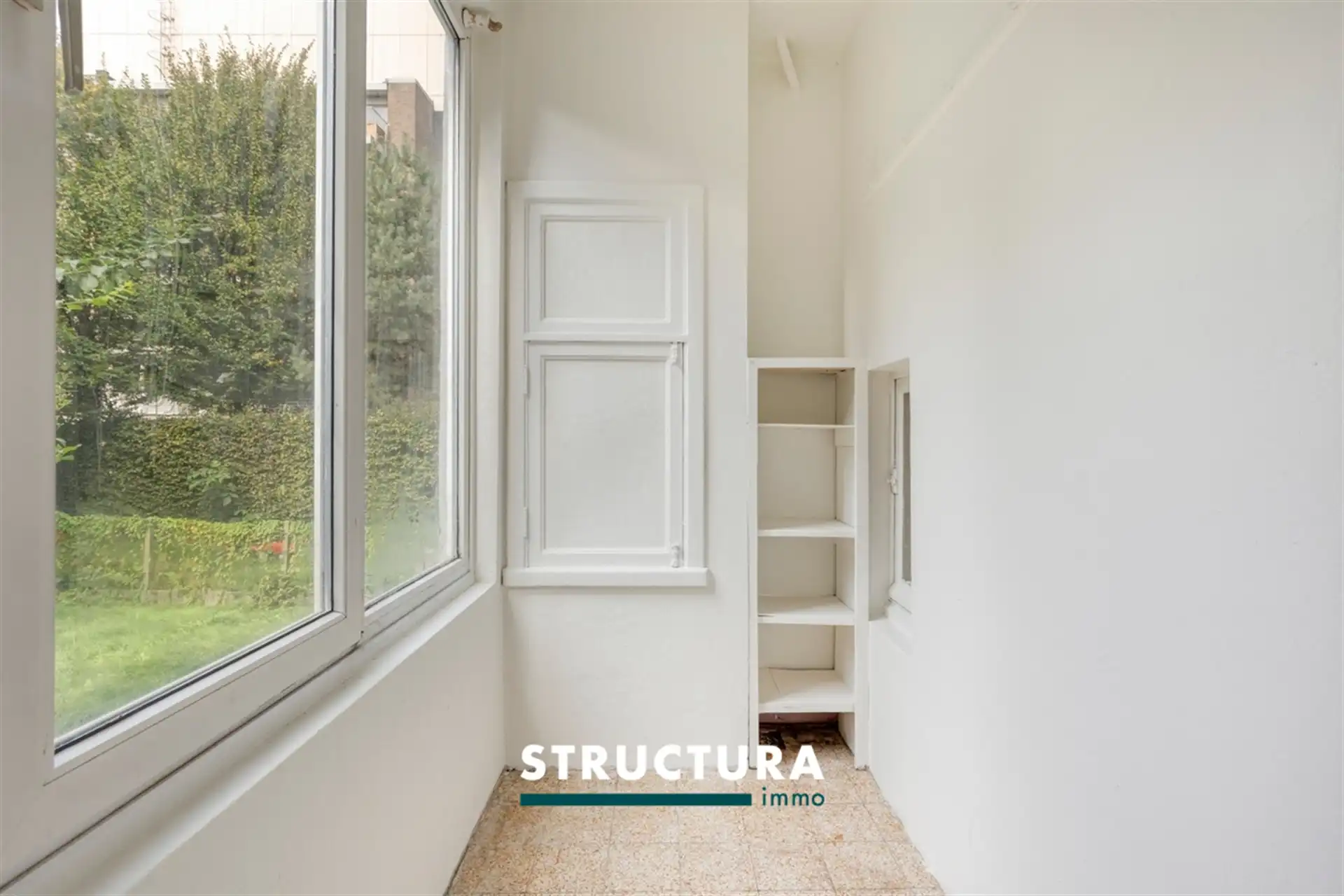Gerenoveerd appartement met tuin op centrale ligging foto 12