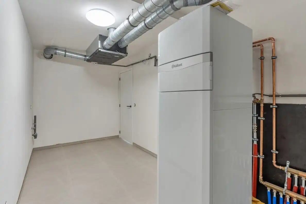TE KOOP – Ruim nieuwbouw gelijkvloers appartement met tuin en garage in het centrum van Helchteren foto 12
