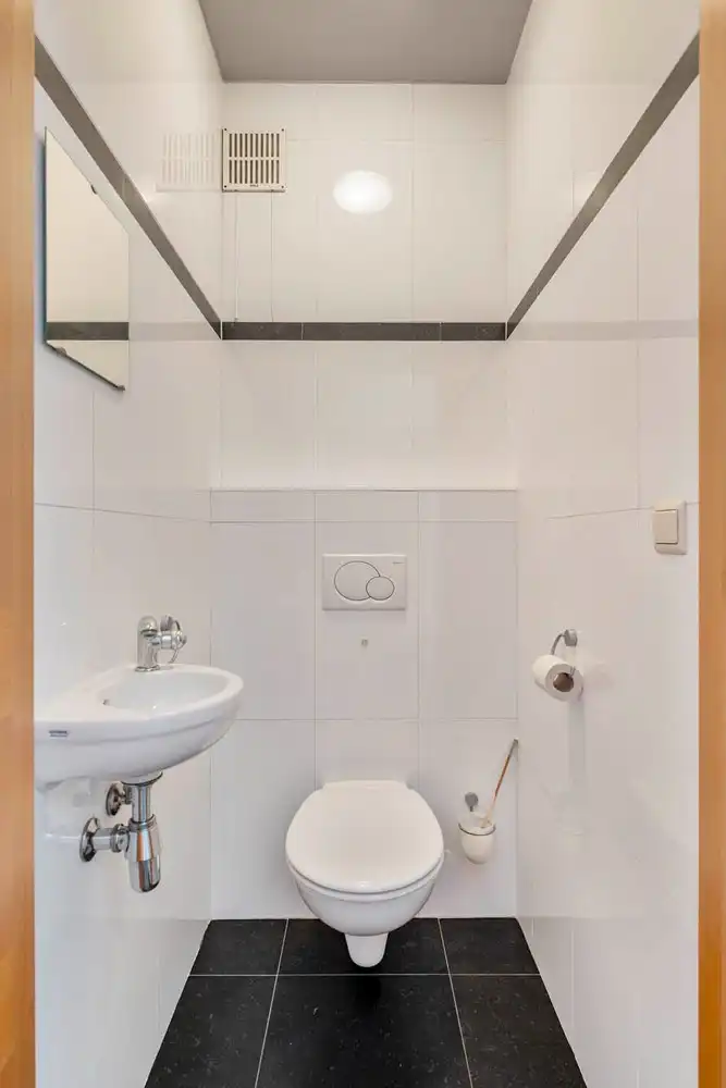 Instapklaar 2-slaapkamerappartement met zuidgericht terras en berging foto 12