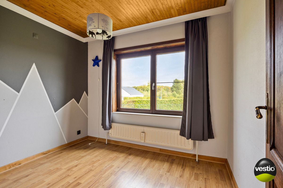 RUSTIG GELEGEN SPLIT LEVEL WONING OP 21A10CA TE KORTESSEM. foto 21