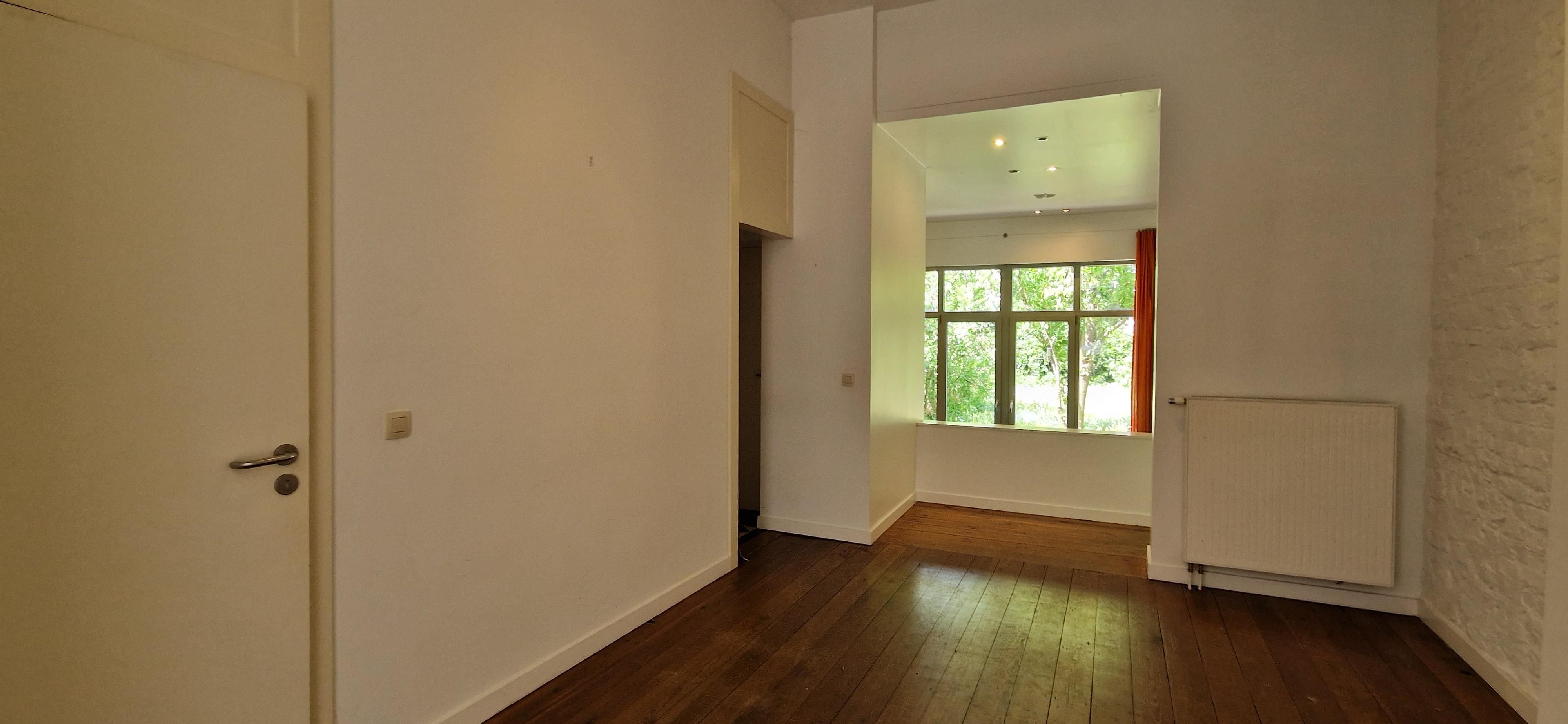 Karaktervolle HERENWONING met mooie leefruimten, 4 slaapkamers en een rustgevende tuin  op 1 are 70 ca.   foto 9