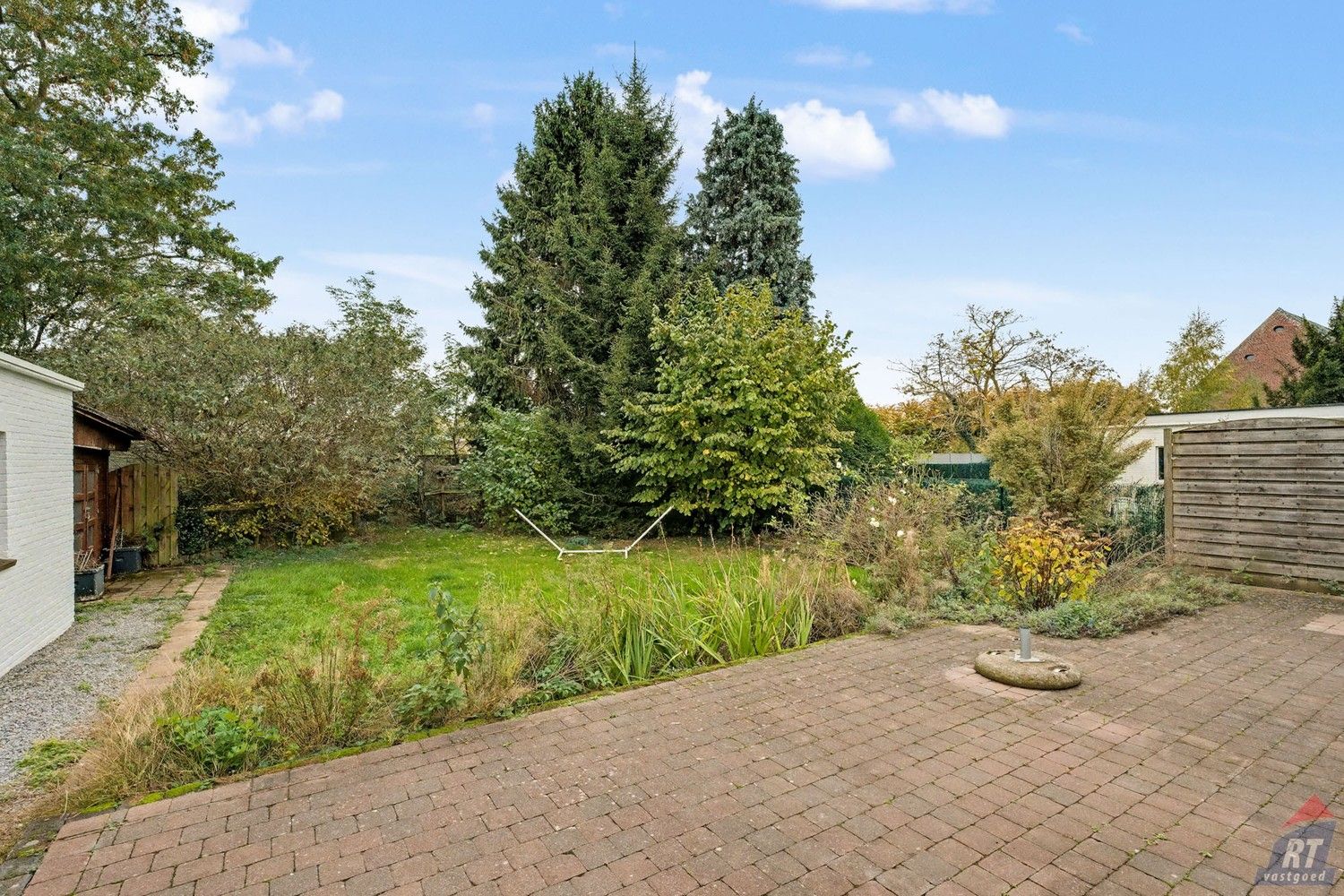 Gelijkvloerse halfopen woning met tuin en renovatiepotentieel in het hart van Sint-Truiden foto 17