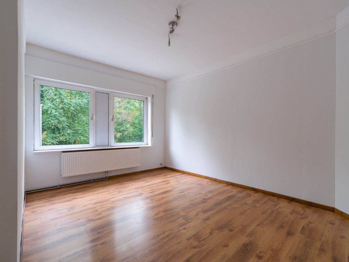 Ruime, instapklare woning met 4 slpk., inpandige garage en tuin foto 19