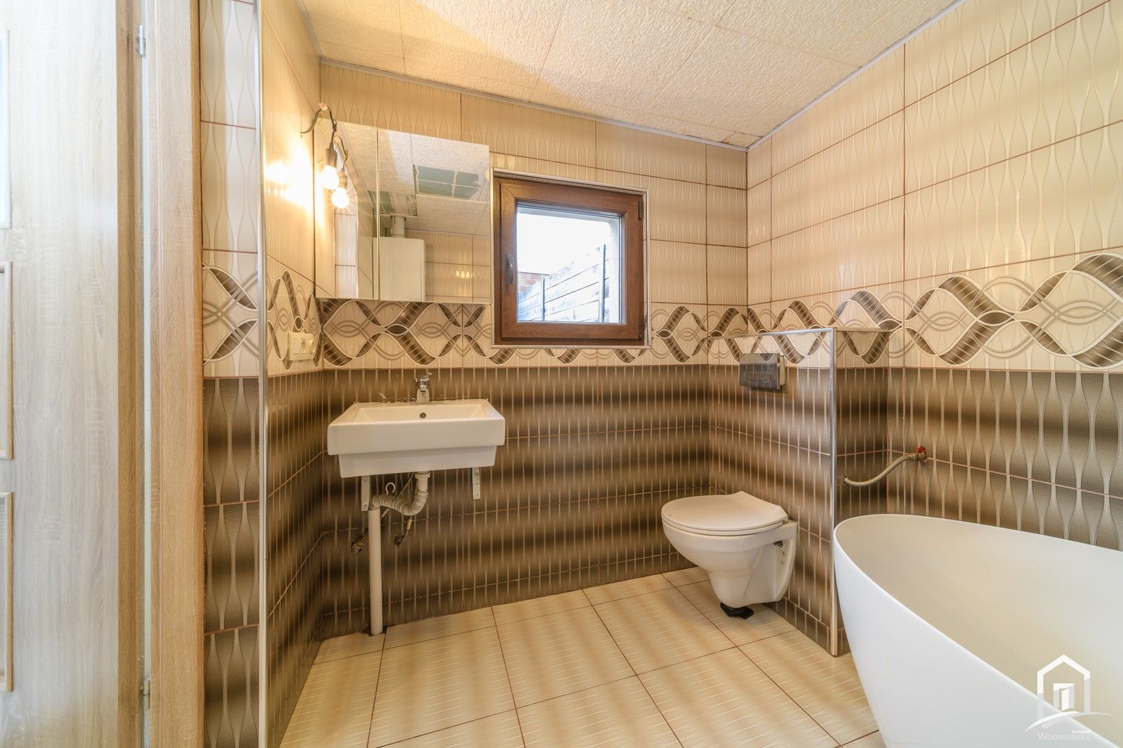 Verder af te werken gezinswoning te Zelzate foto 6