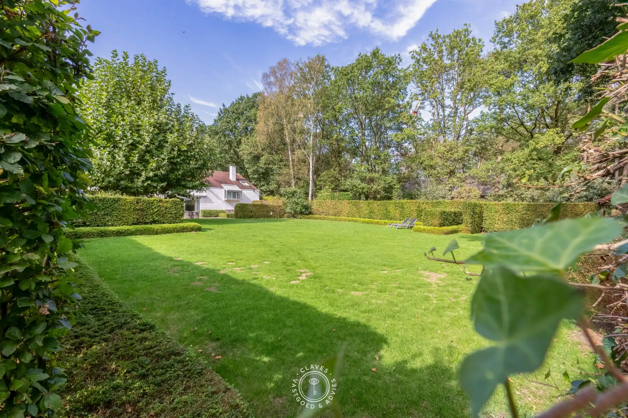 Residentiële villa op een uitzonderlijk groen perceel van meer dan 2.000 m² in de gegeerde Eikenlaan te Belsele foto 28