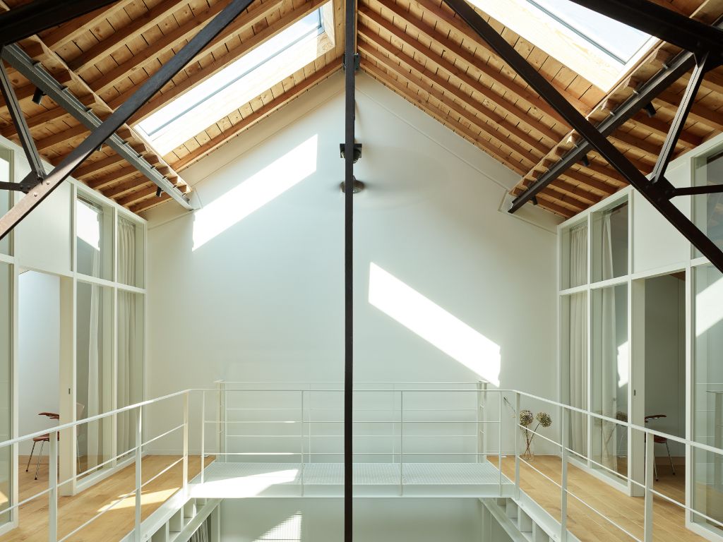Luxueus en tijdloos – Exceptionele loft met 2 slaapkamers (mogelijkheid tot 3), ontworpen door ‘Plano Architecten’, in een beschermd gebouw met een rijkelijke industriële voorgeschiedenis. foto 11