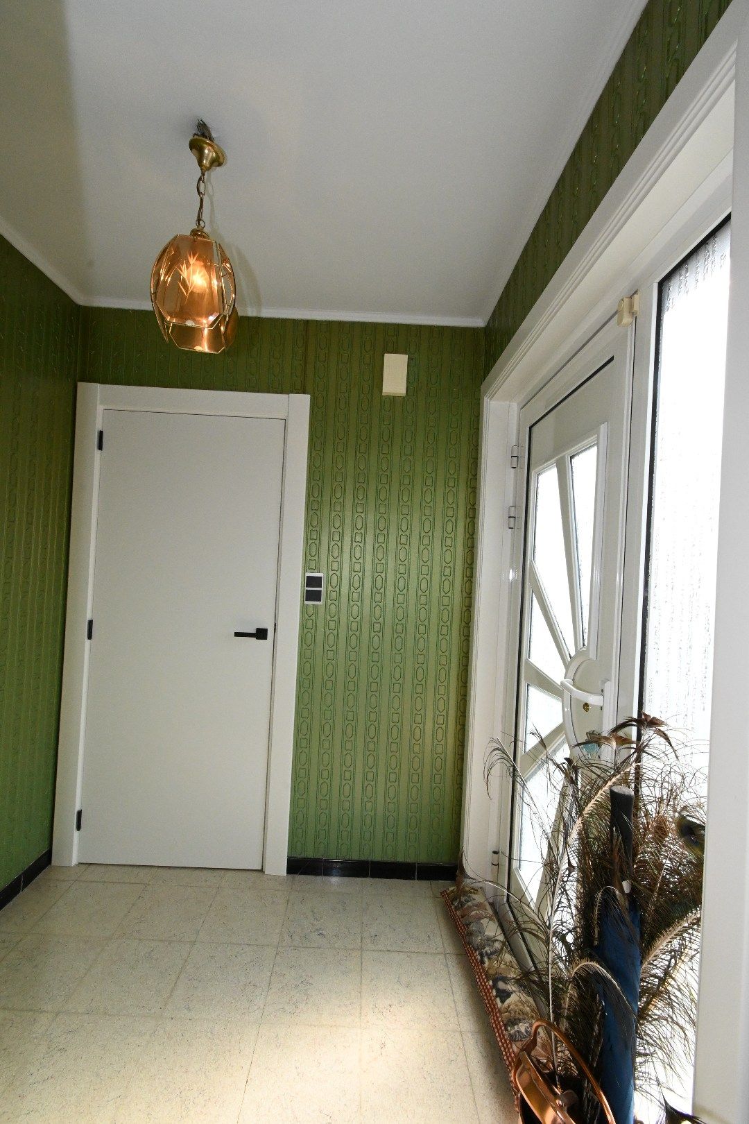 Alleenstaande woning met carport en tuin foto 4